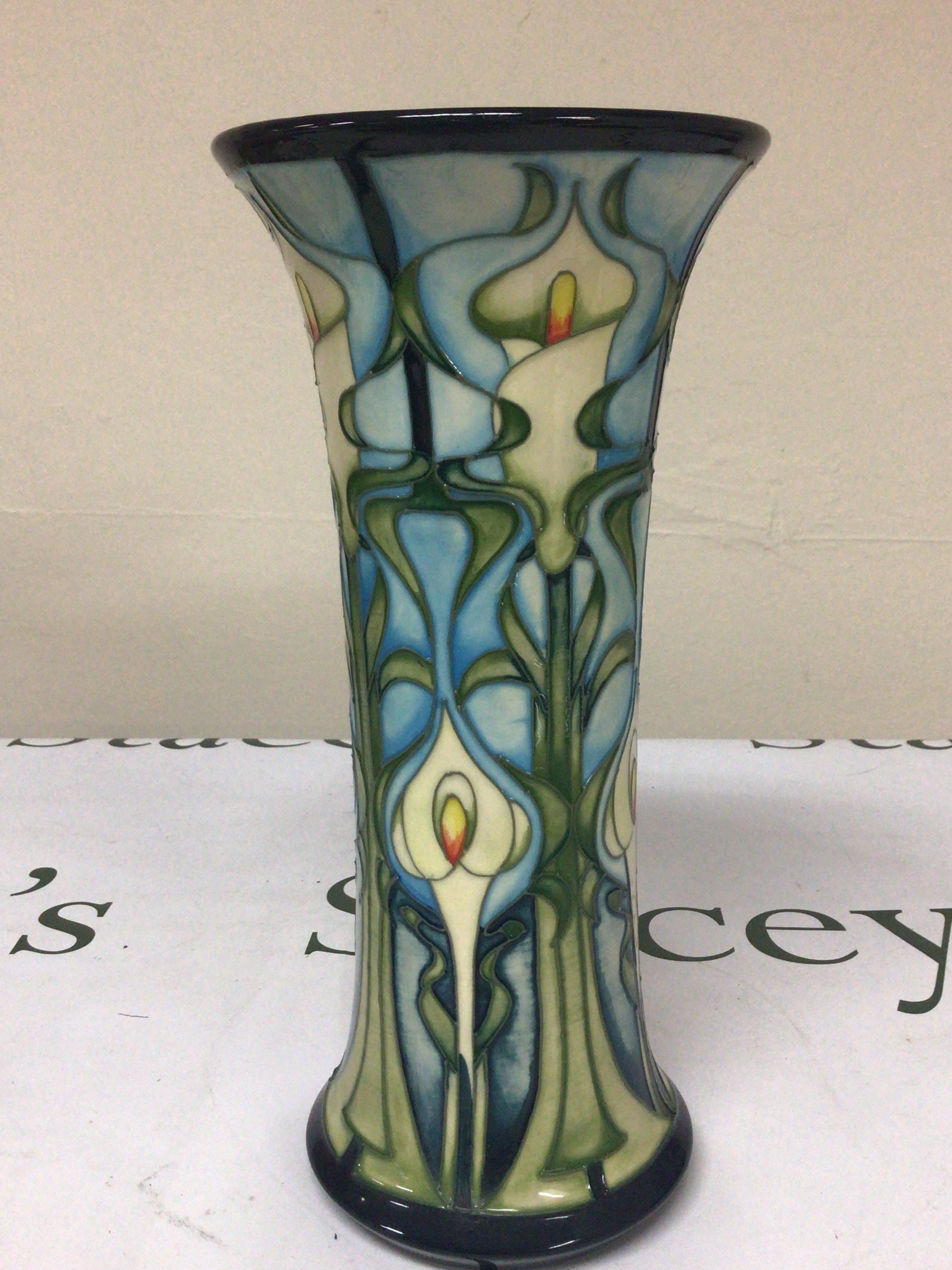 A Moorcroft vase with signed base dated 2001 no obvious damage or restoration. Height 26cm.
