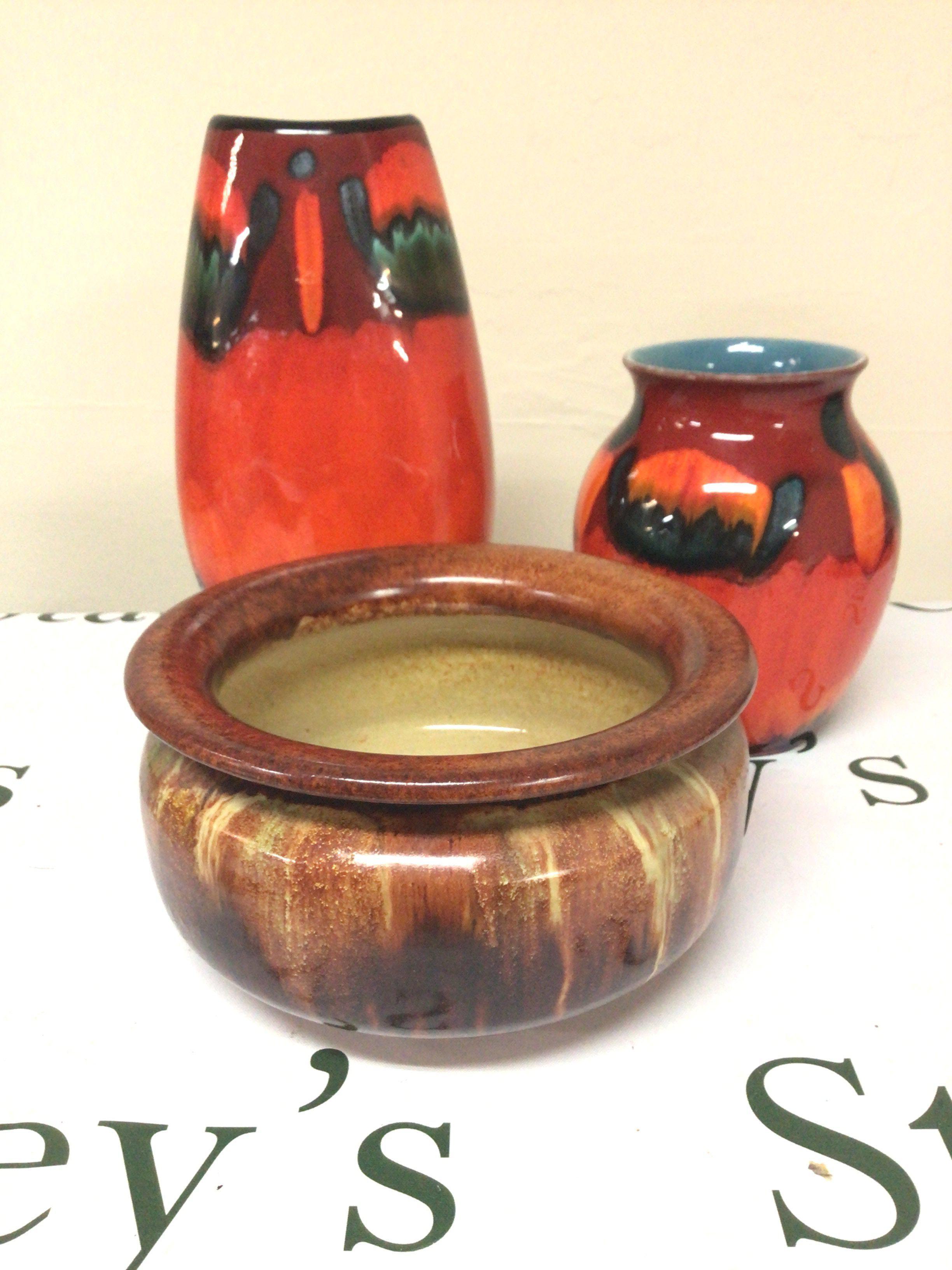 An unusual Carter Stabler Adams Poole pottery bowl and two brightly coloured Poole Pottery Vases. Hight 26cm no obvious damage.