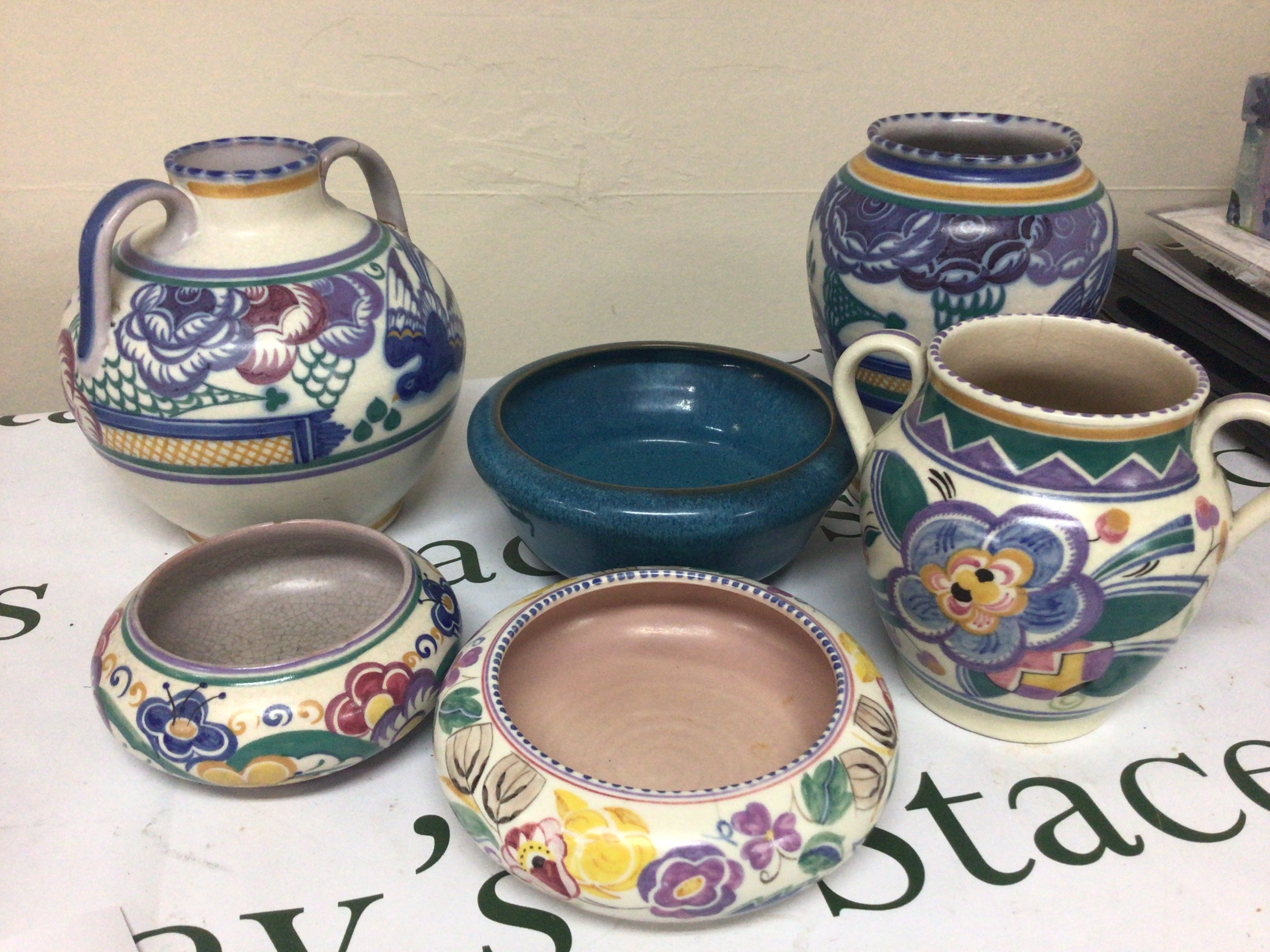 A collection of Poole Pottery Including early Carter Stapler Adam Poole (6) some damage.