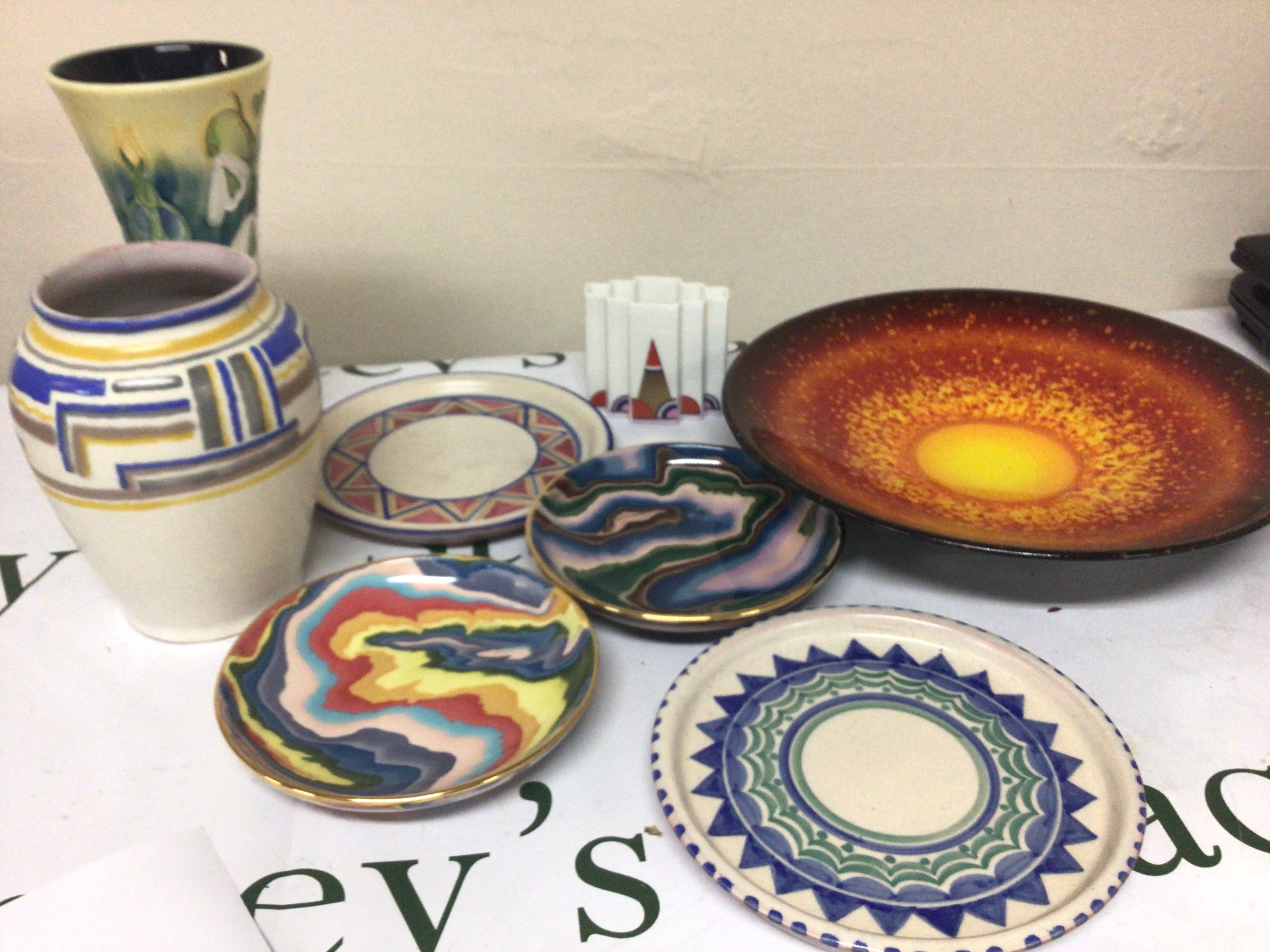A limited edition Poole dish Sun & Moon 45/1000 signed to the reverse An Art Deco design Poole cigarette holder Jersey Bouchet Agate ware limited edition and other ceramics.