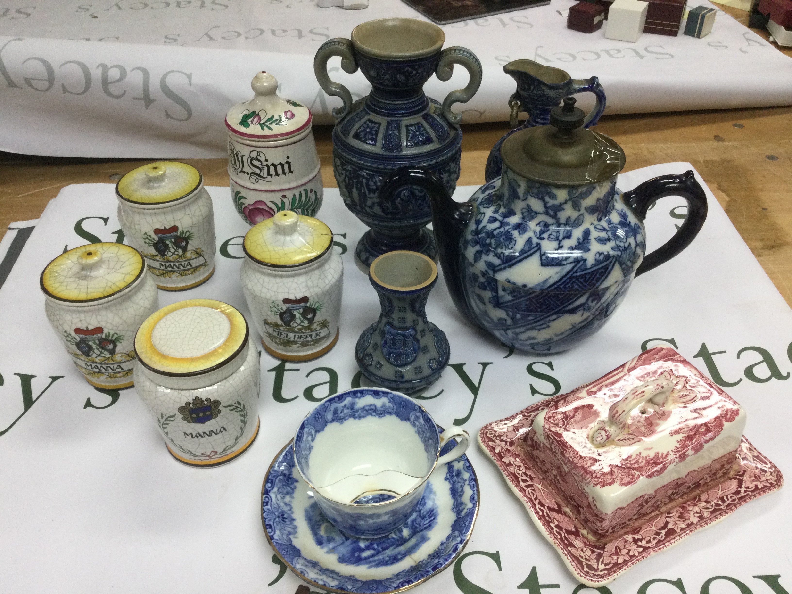 A collection of ceramics including a Doulton teapot, apothecary jars etc. Shipping category D.