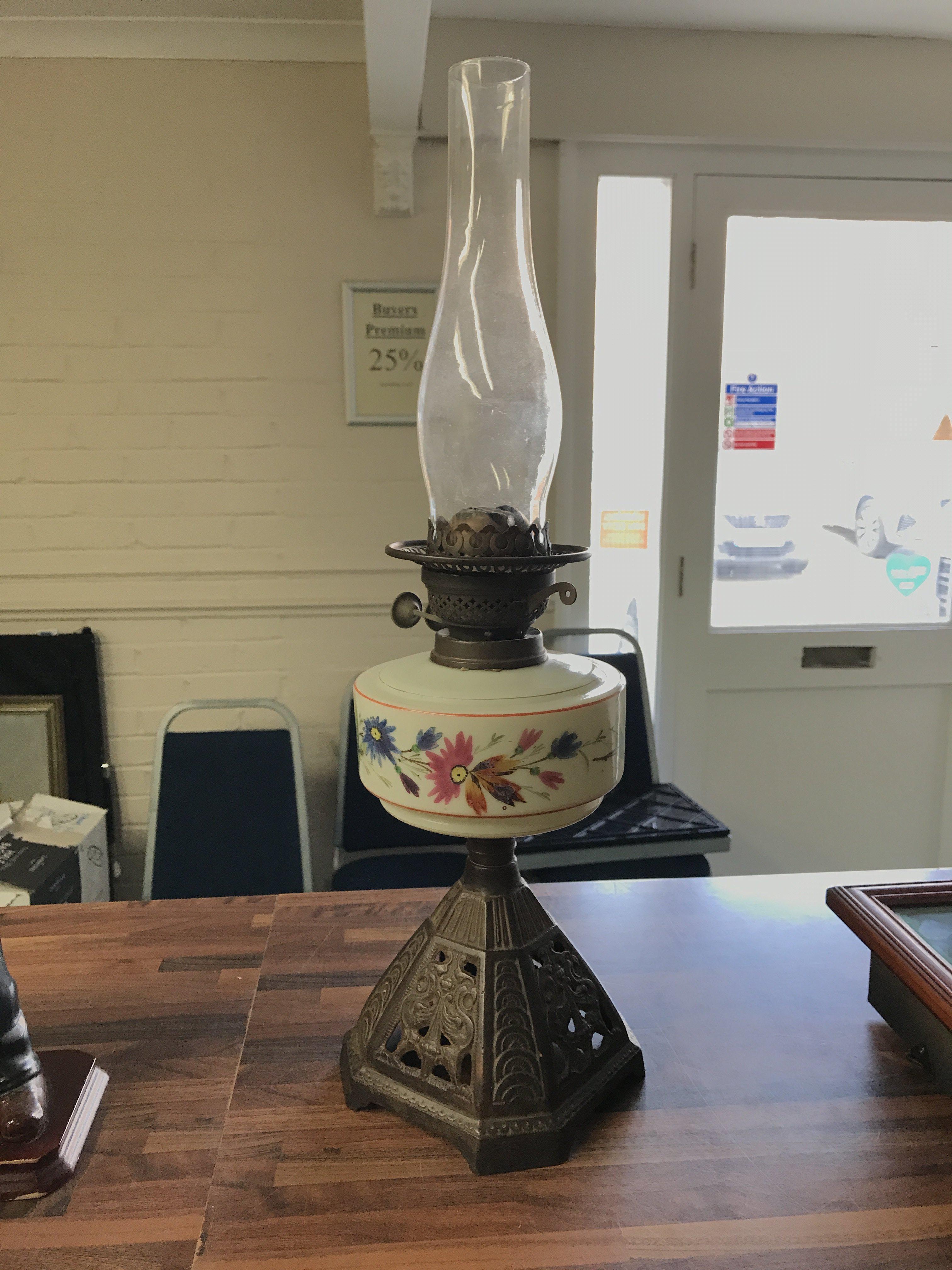 An oil lamp with funnel. No reserve