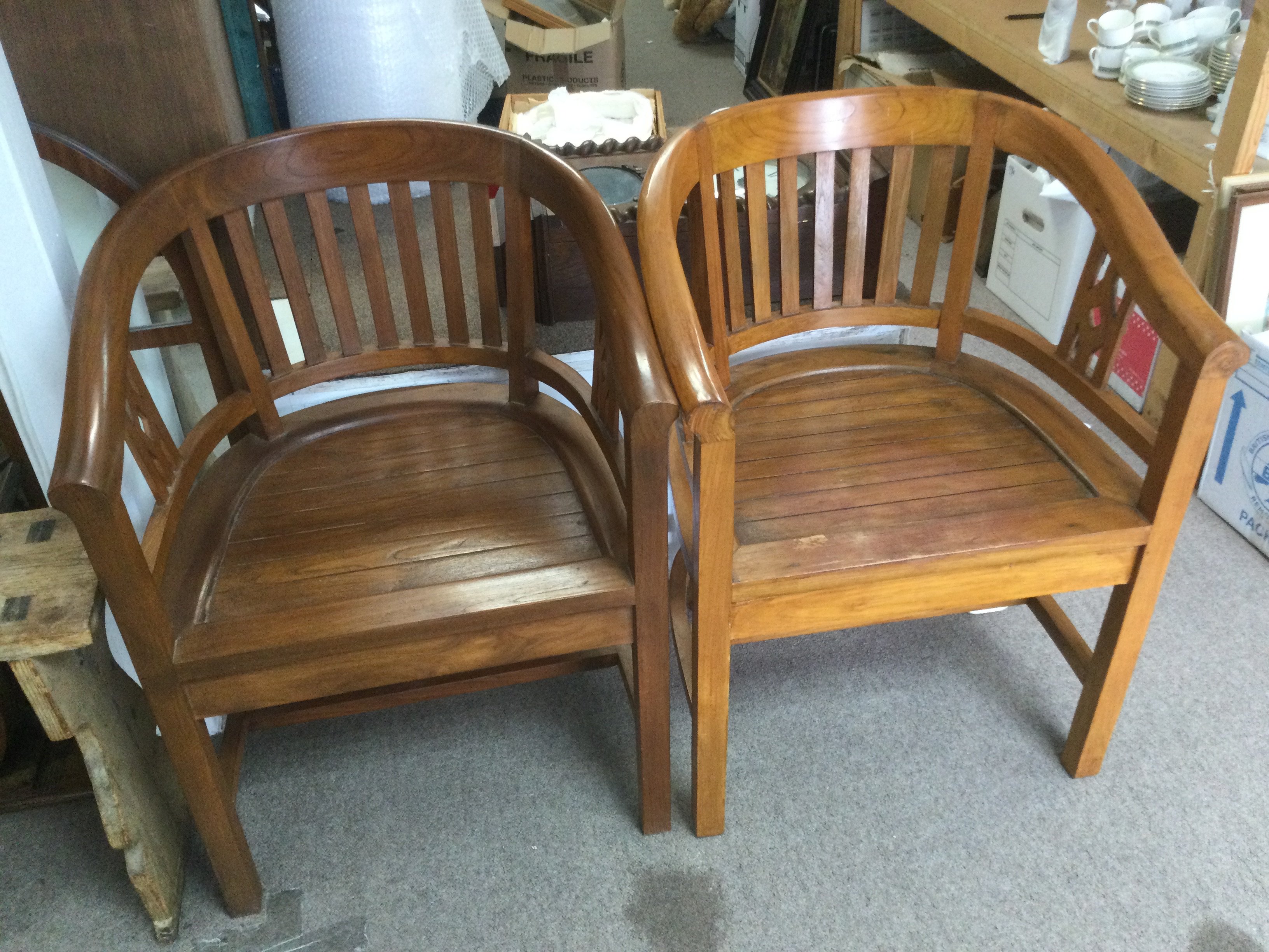 A pair of hardwood chairs. Shipping category D.