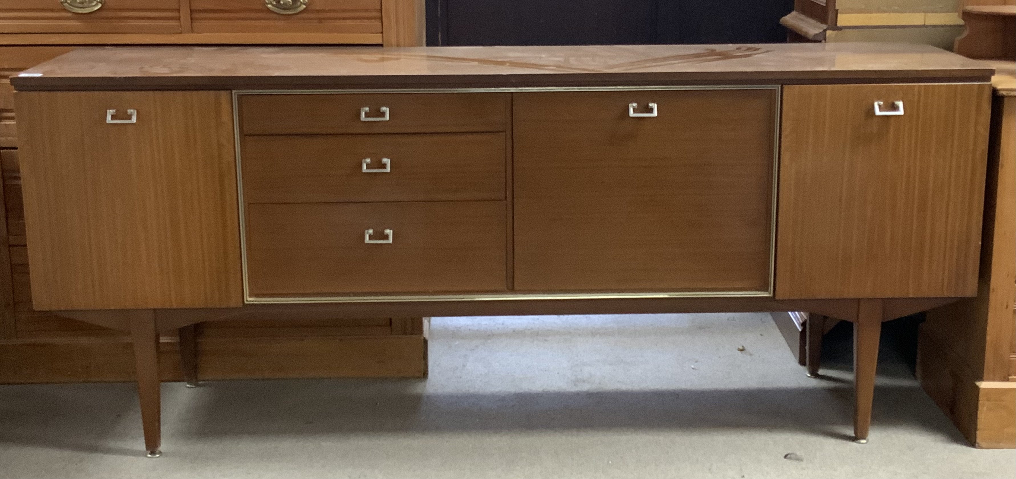 A Mid Century Nathan sideboard, 184cm x 44cm x 77cm
