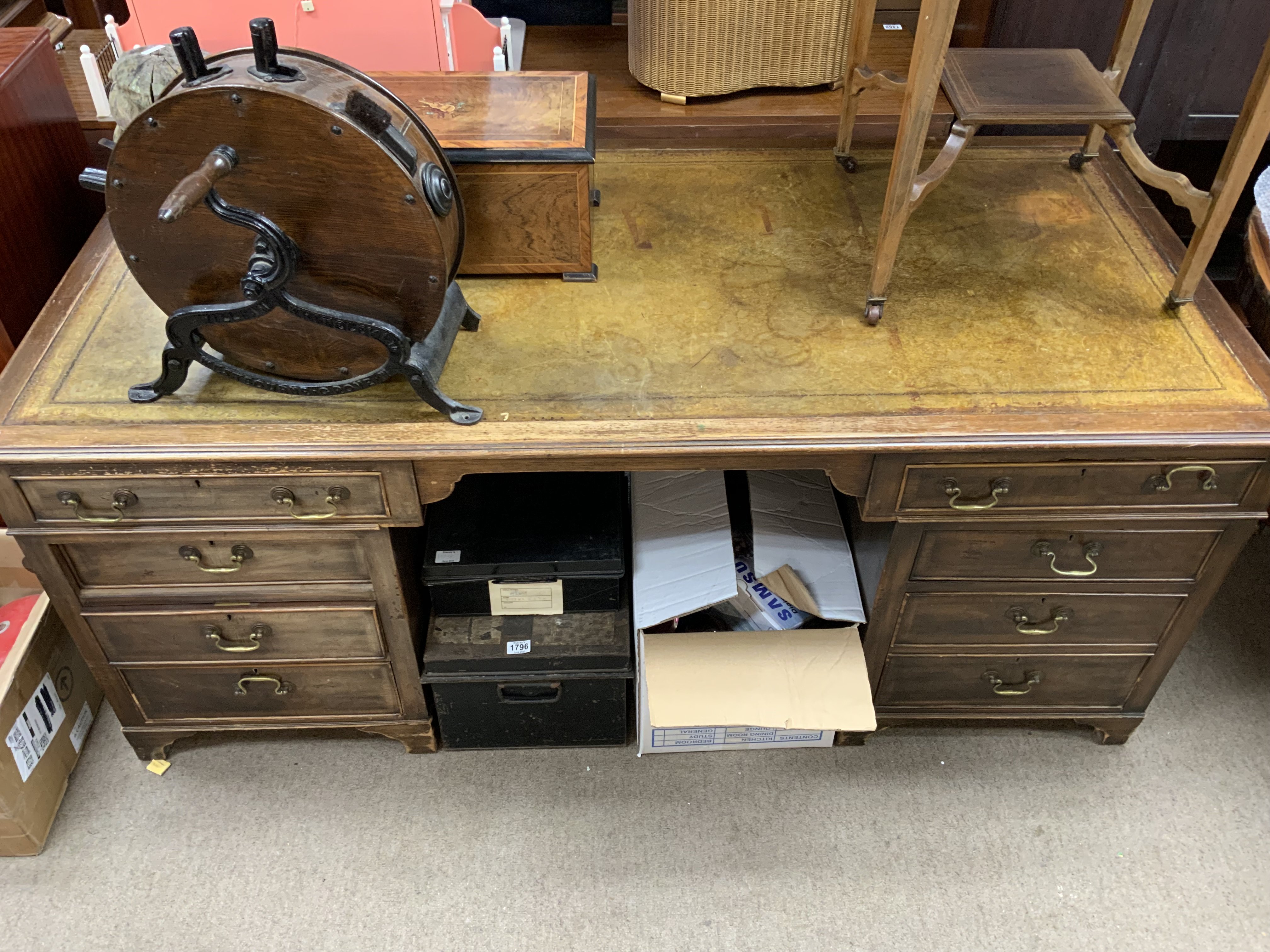 A large 1930s leather topped pedestal desk. 177cm x 86cm x 75cm