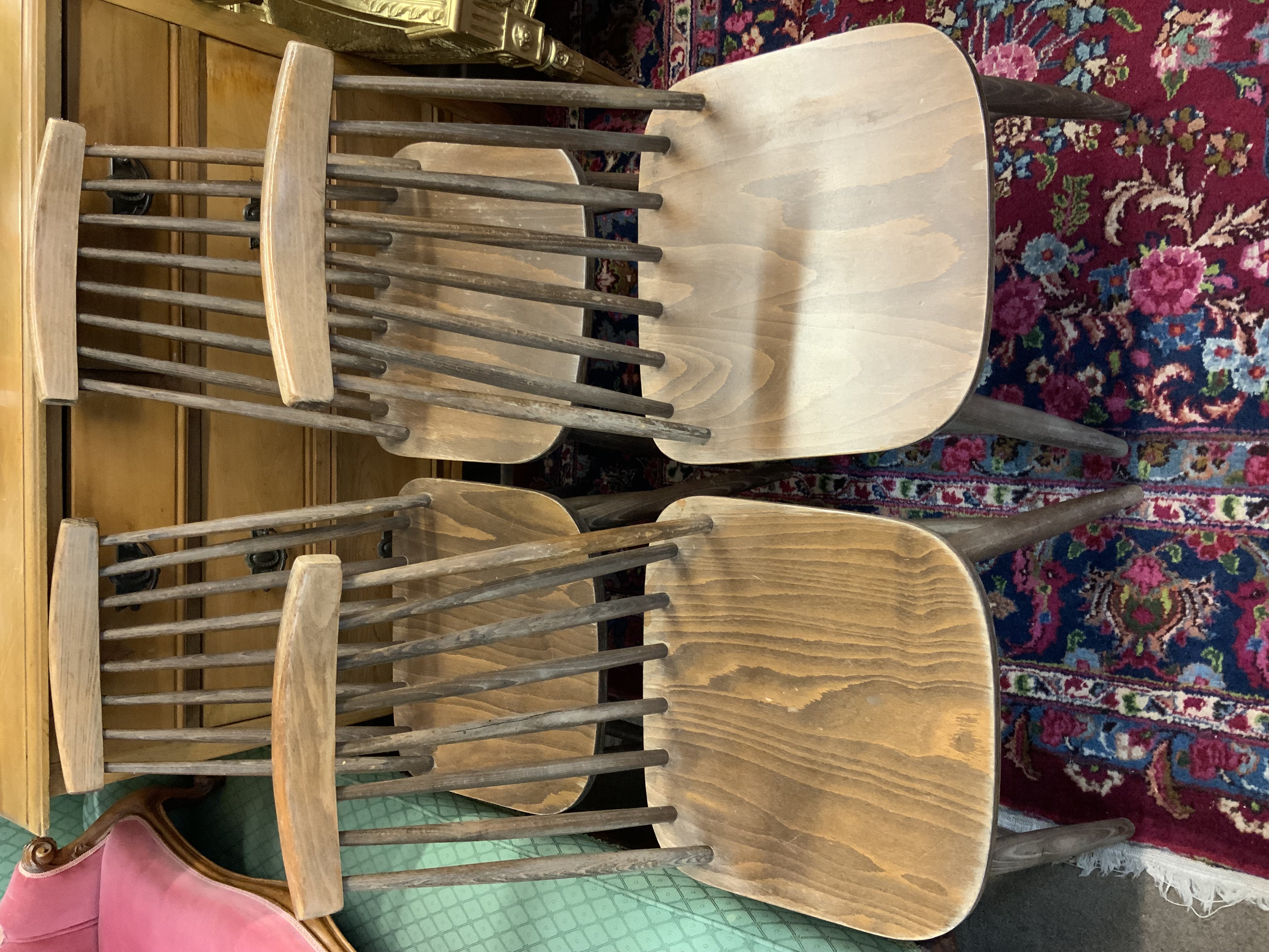 4 Mid Century stick back dining chairs.