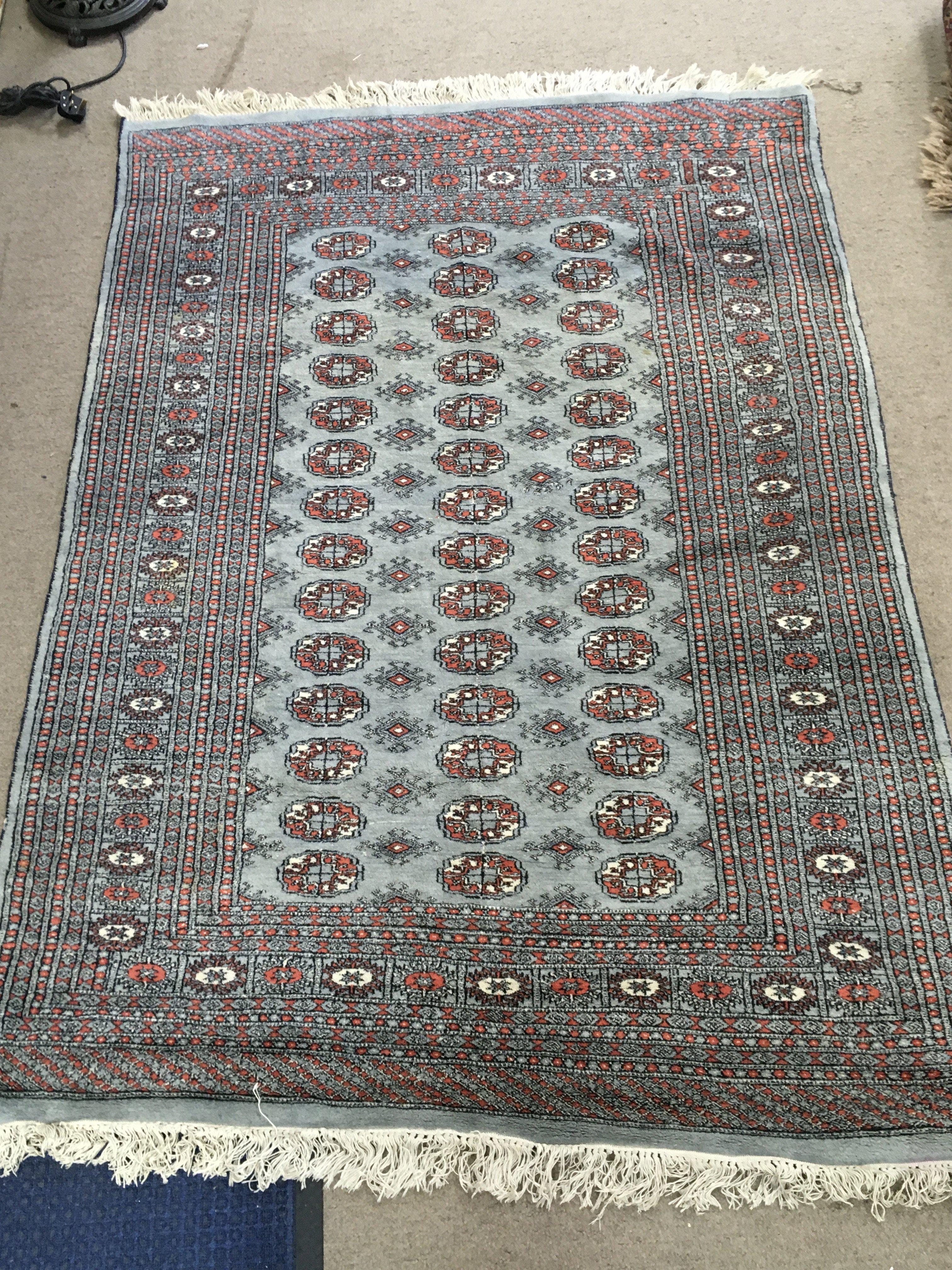 A Bokhara rug dimensions 184x130cm