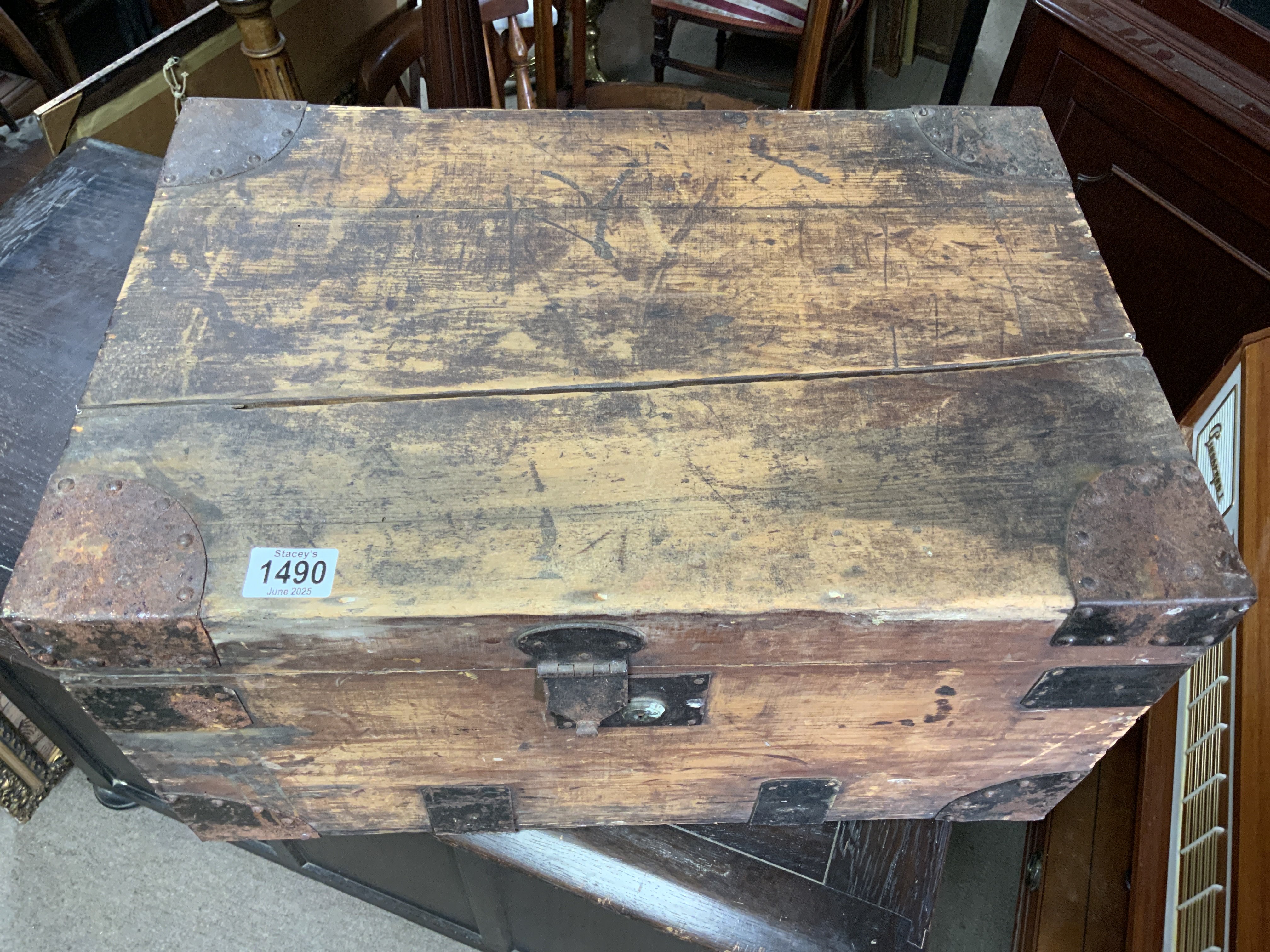 Small pine trunk with metal mounts.