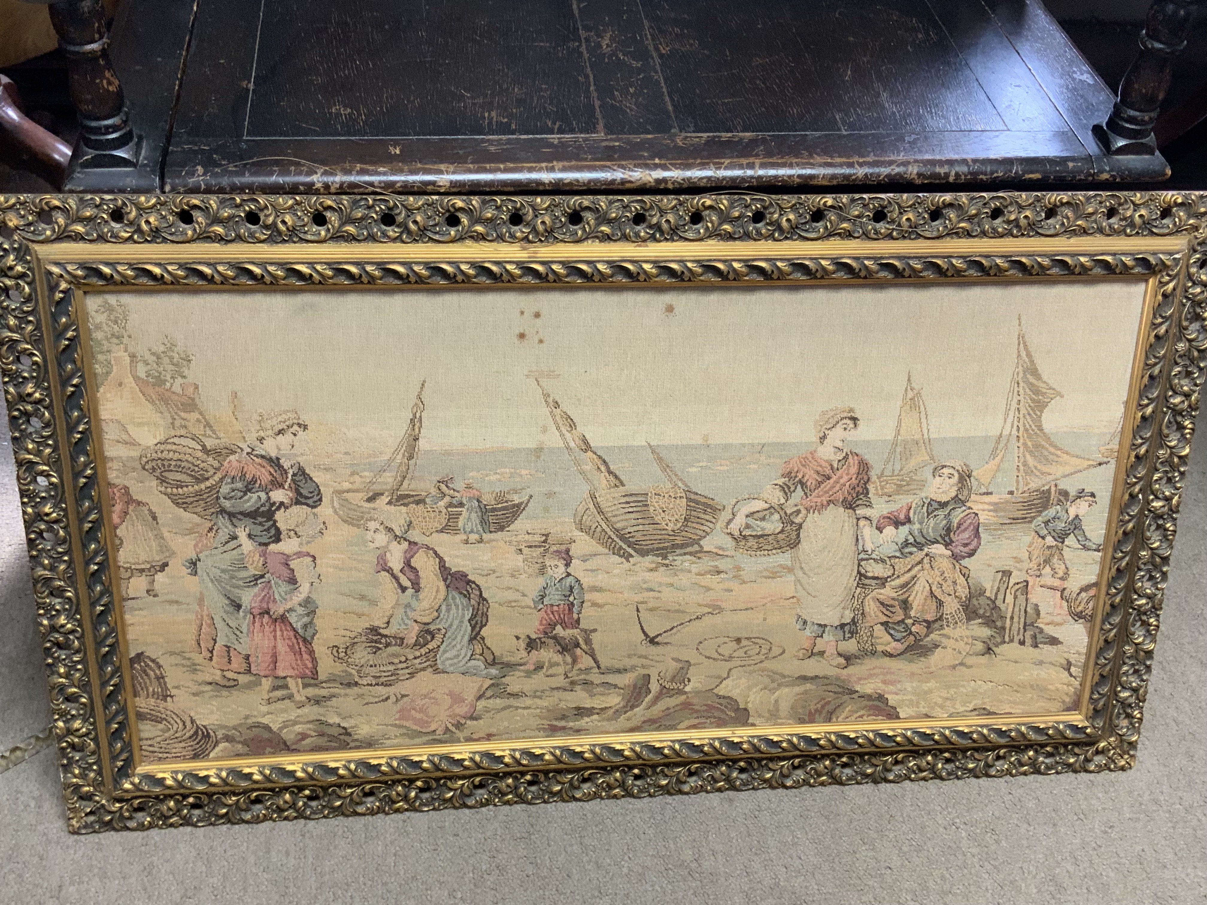 a Goliath framed fisherman tapestry.