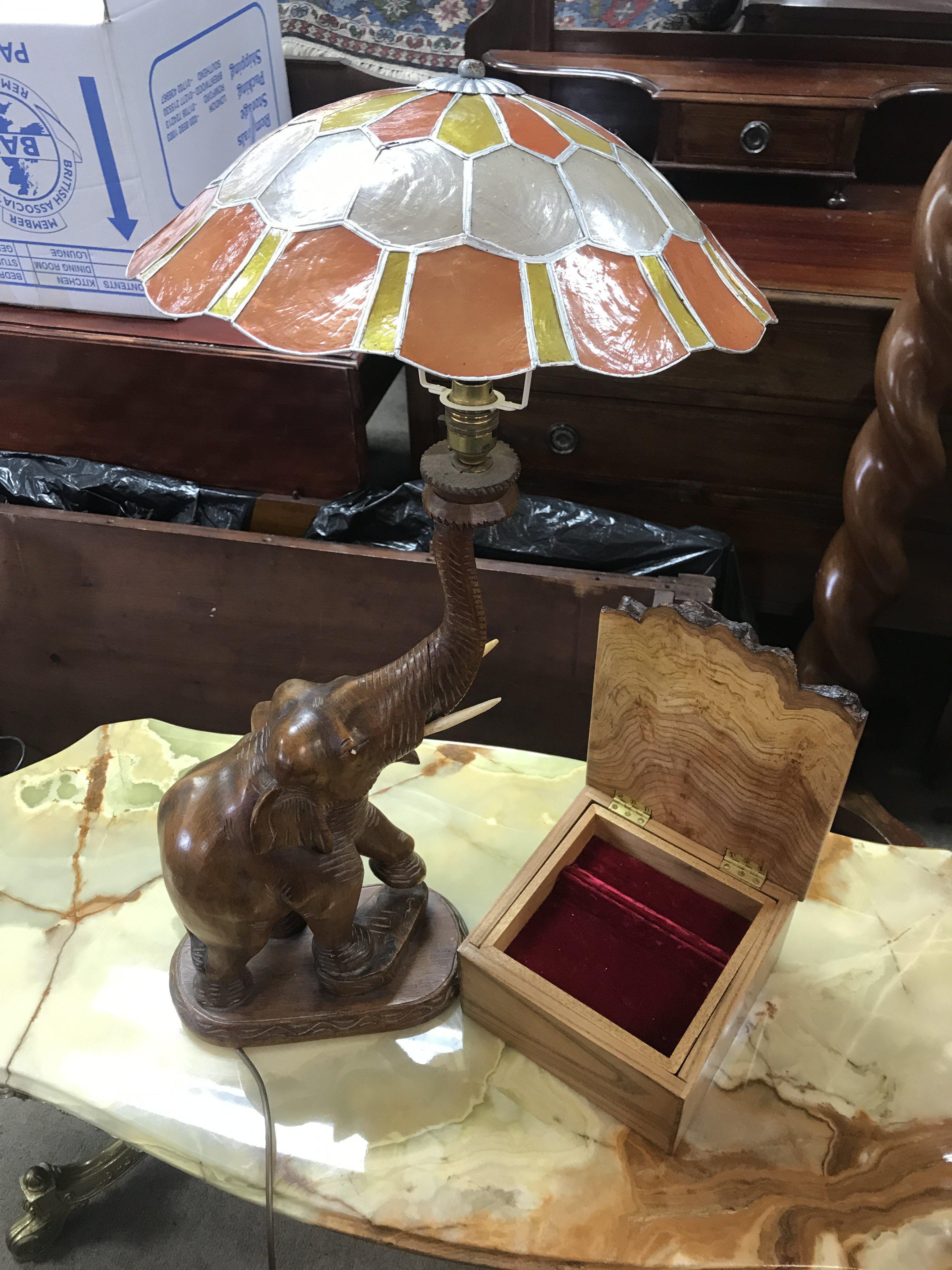 Modern walnut box with fitted interior and carved elephant lamp. This lot cannot be posted