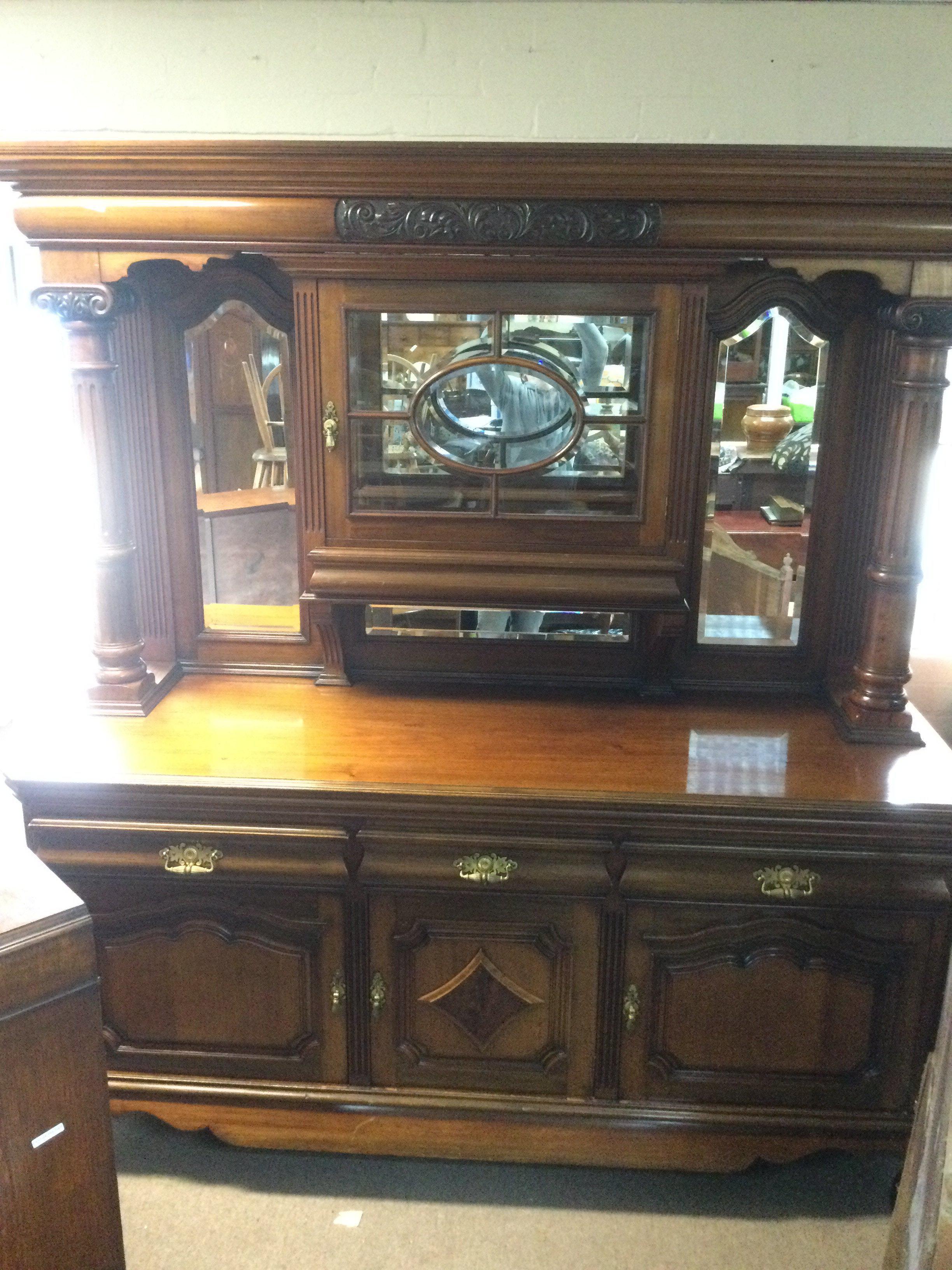 A large Edwardian mirror backed sideboard with Ionic column supports, approx 200cm x 220xm x 66cm. Shipping category D.