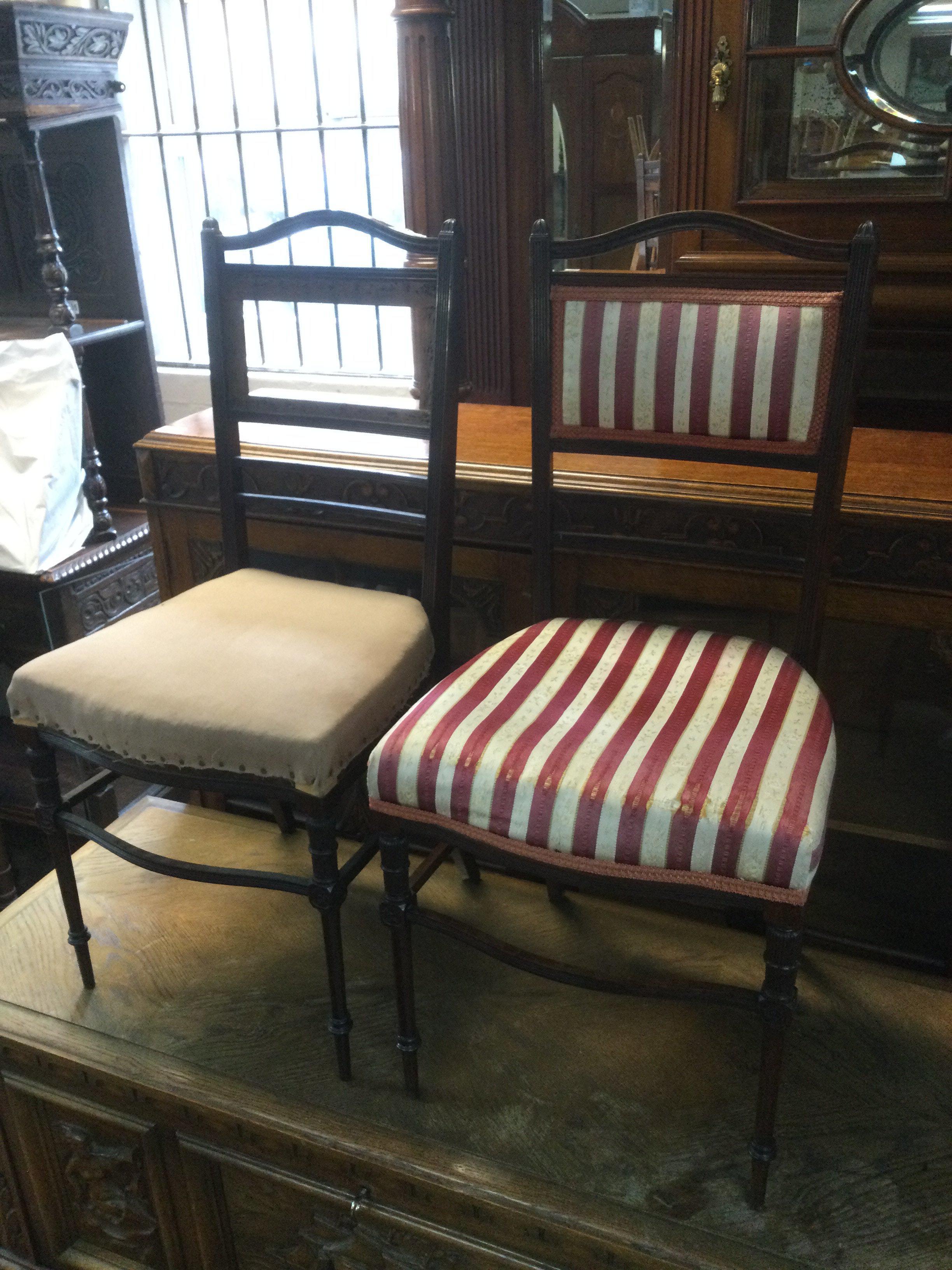 A pair of Edwardian upholstered occasional chairs. Shipping category D.