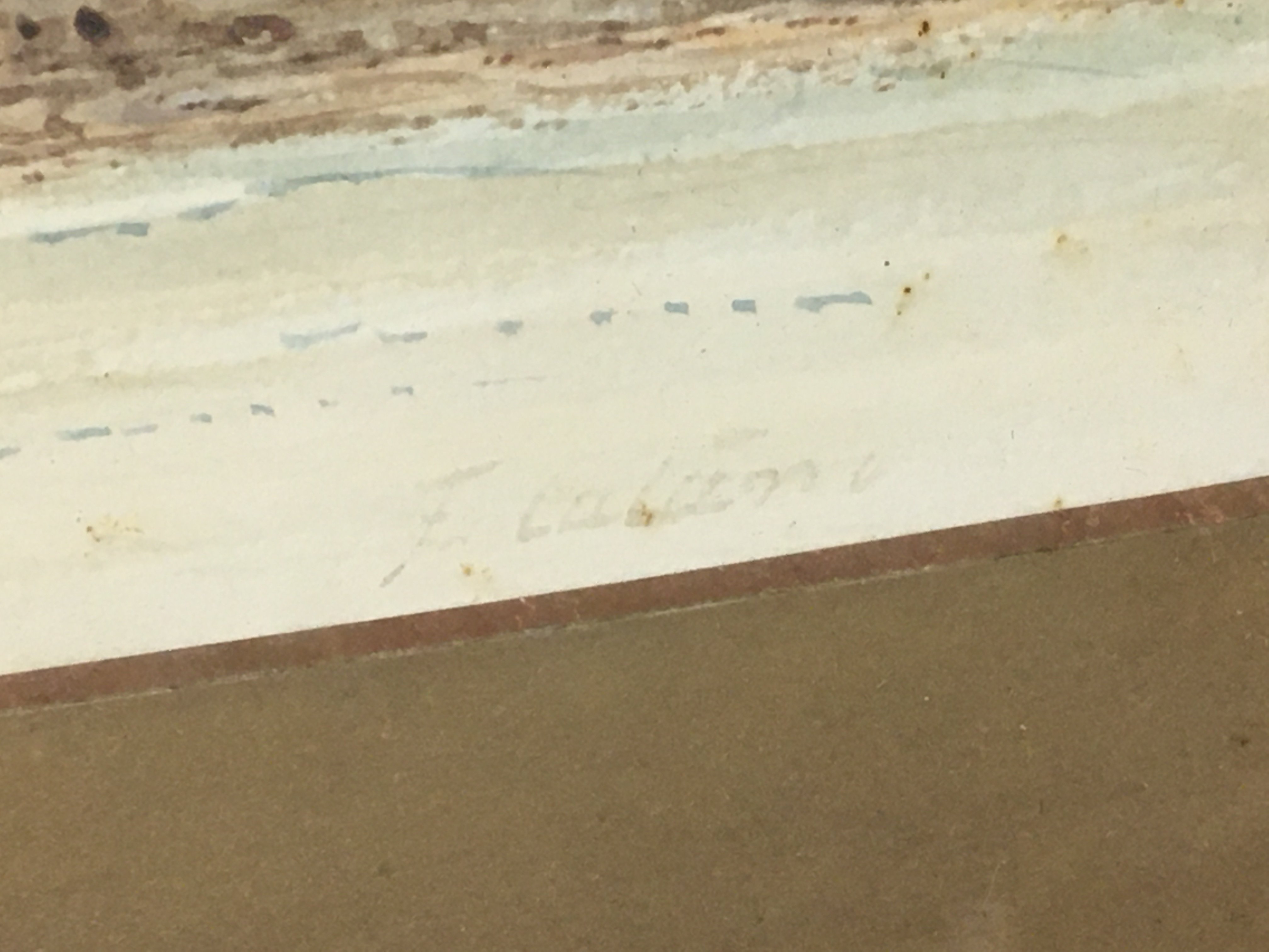 A 19th century watercolour study of moored sailing vessels within a bay with buildings and mountains beyond. Indistinctly signed. The dirt/foxing seems to be on the glass. Frame size 70x43cm. NO RESERVE