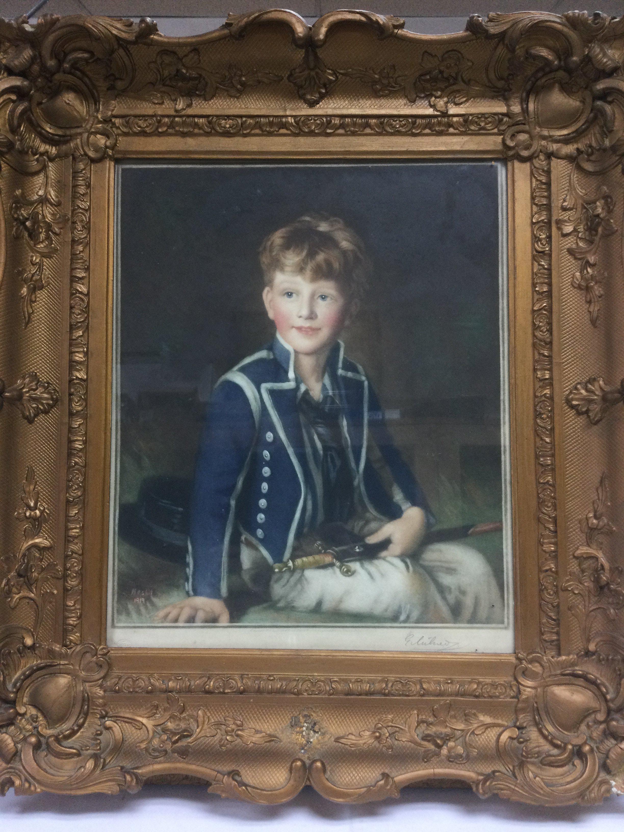 A gilt framed limited edition signed print of a young boy in a Victorian naval uniform, approx 52cm x 59cm. Some slight damage to frame. Shipping category D.