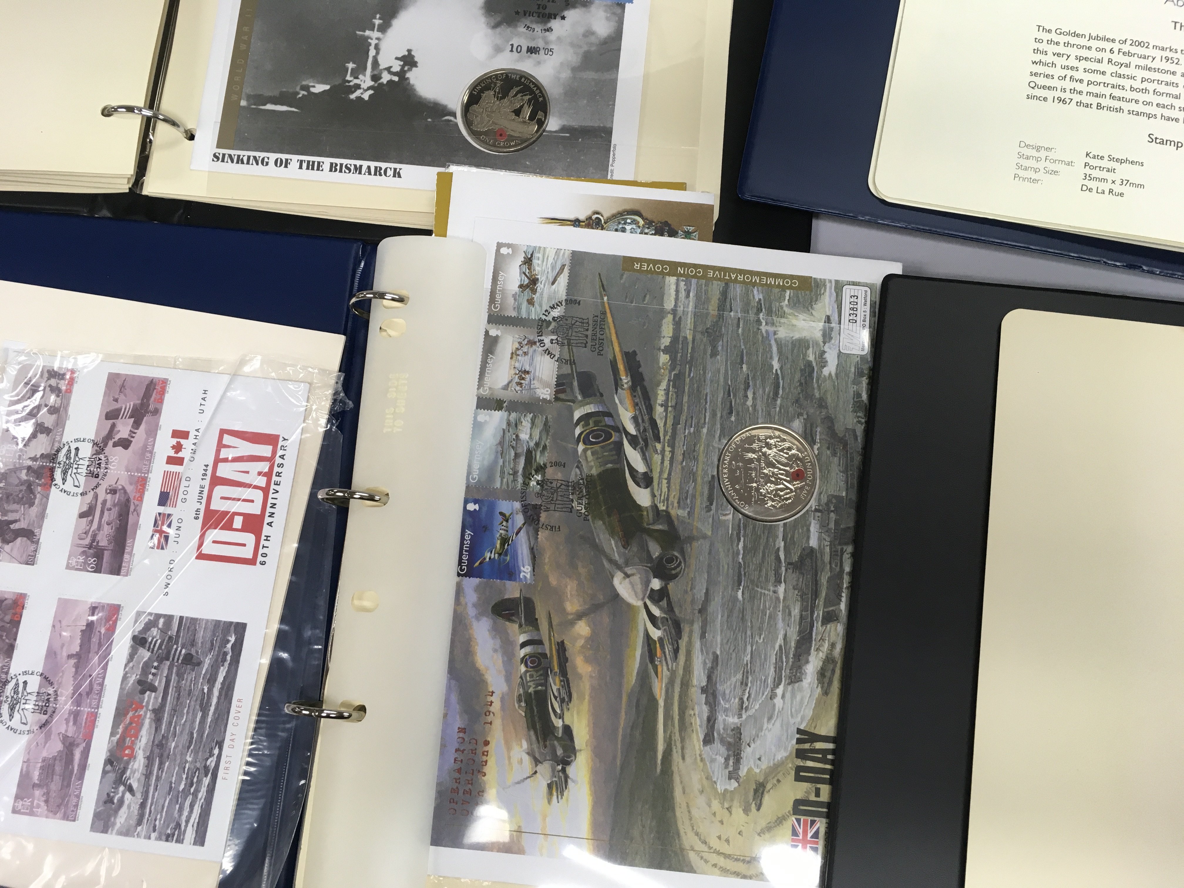 Four albums containing coin covers various.