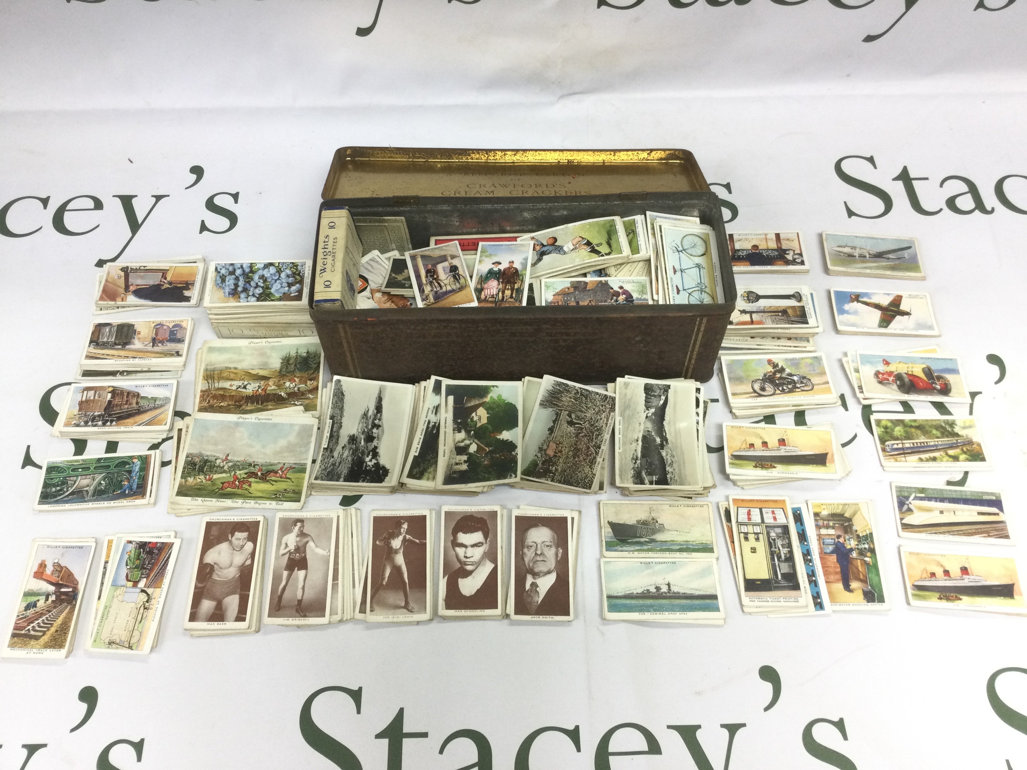 A collection of cigarette cards including Churchman's, Will's, Senior Service and others.