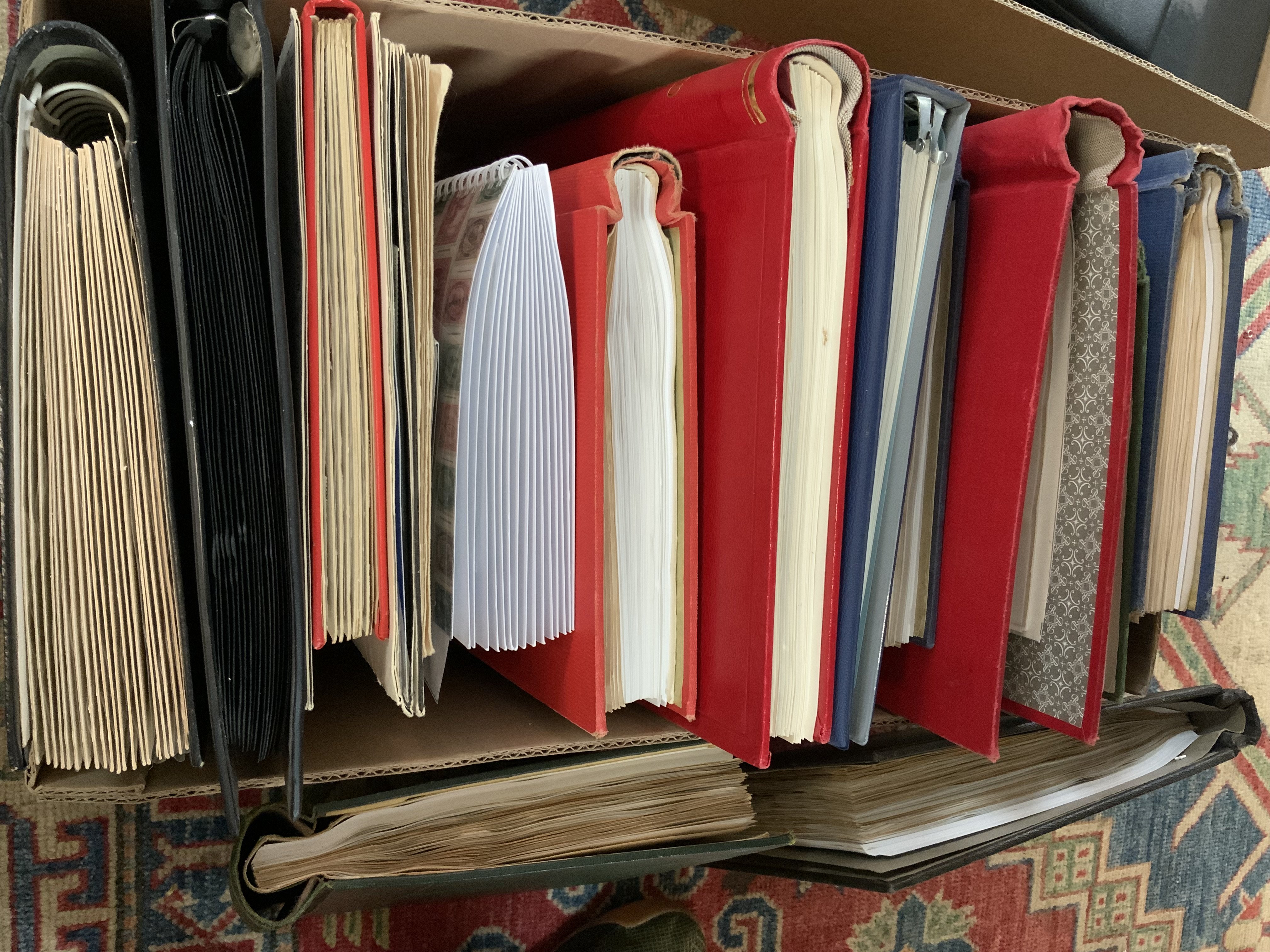 14 GB and World stamp albums and contents. (D)