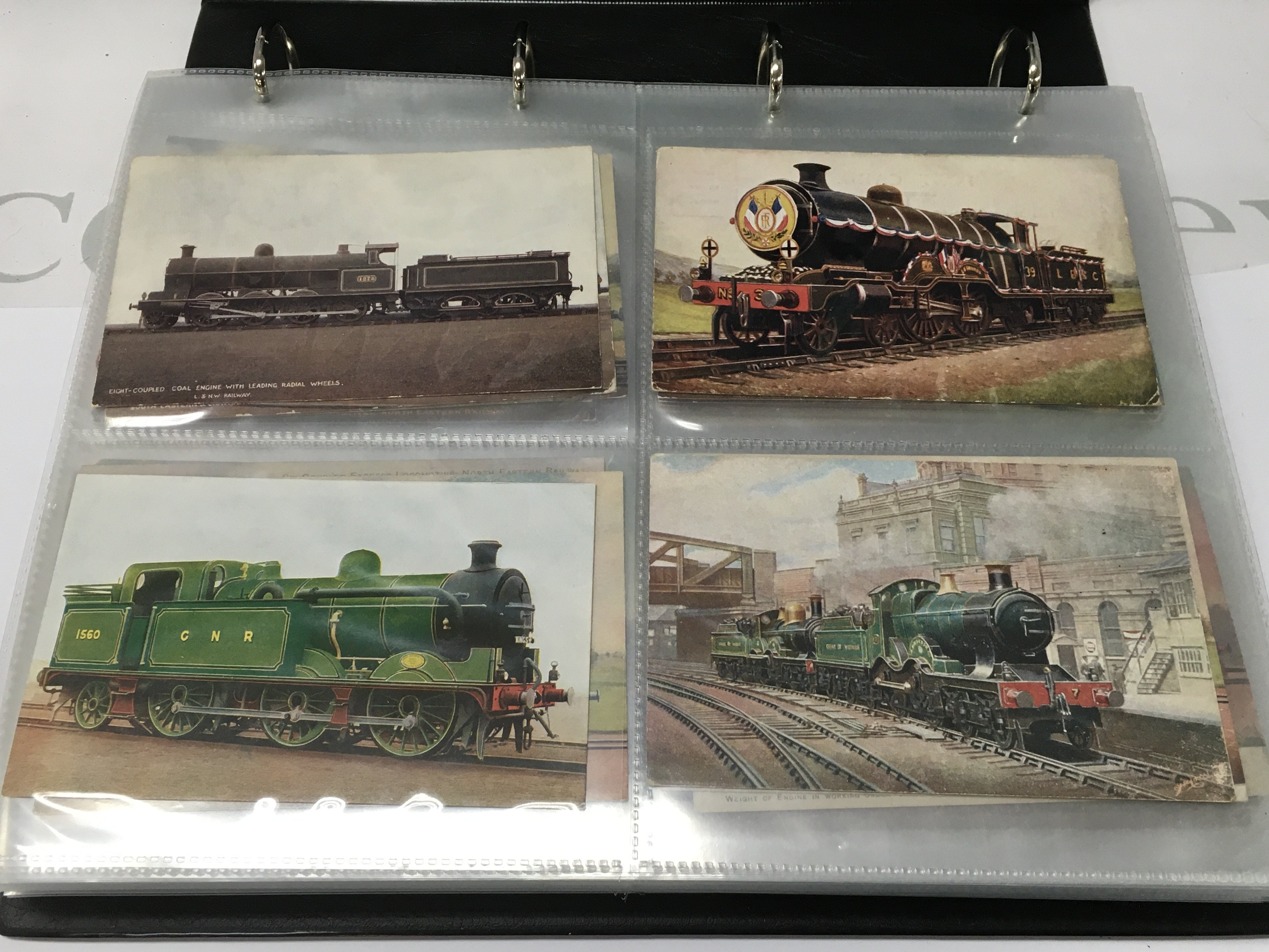 A large album of steam train post cards. Postage B
