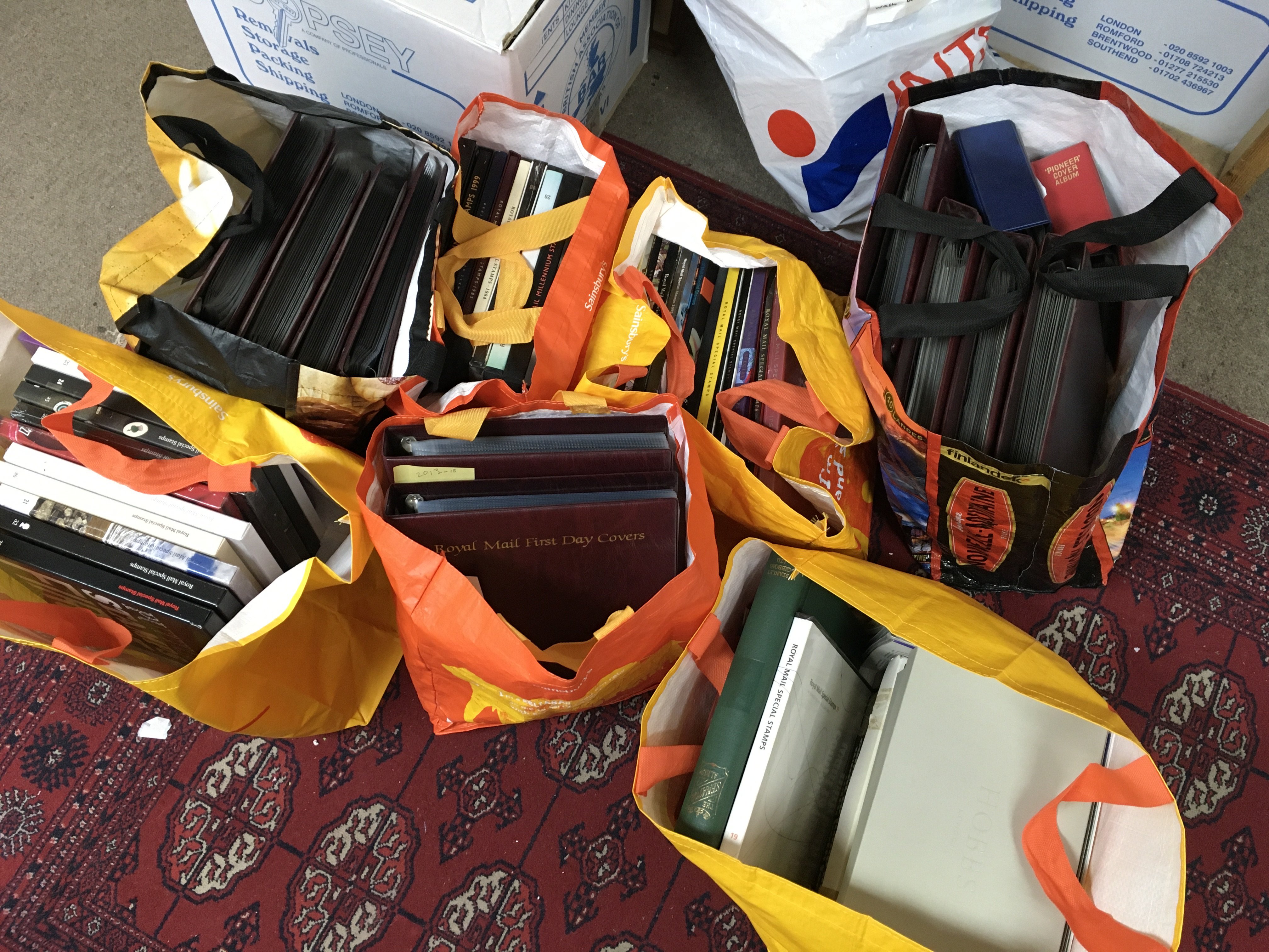 Seven bags of first day covers and and royal mail special stamp albums