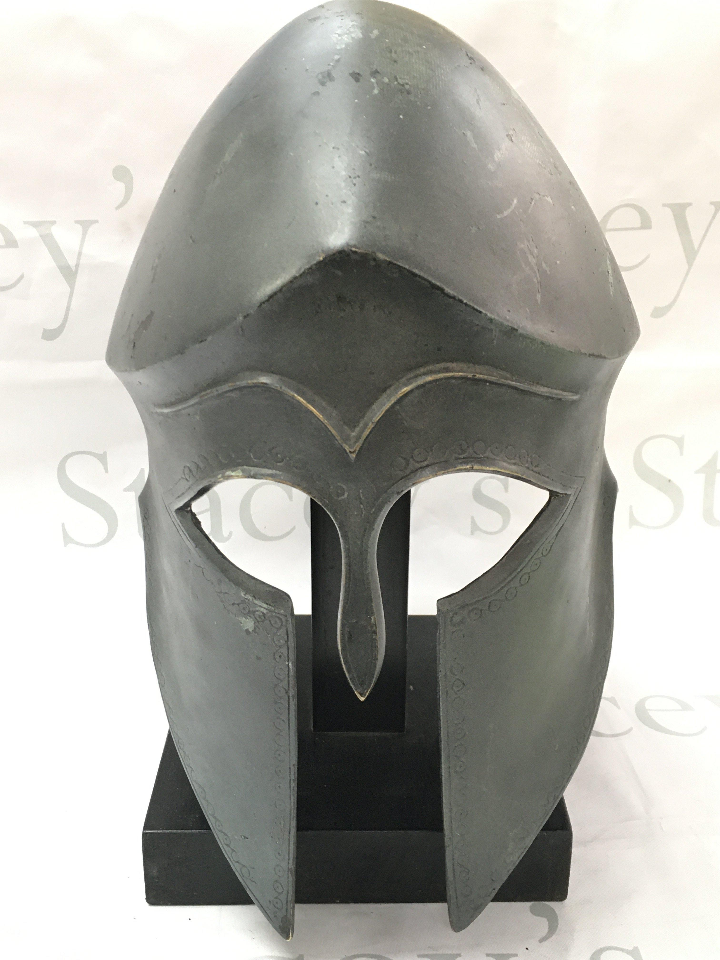A bronze replica Greek Spartan helmet . 26cm tall. Postage catC