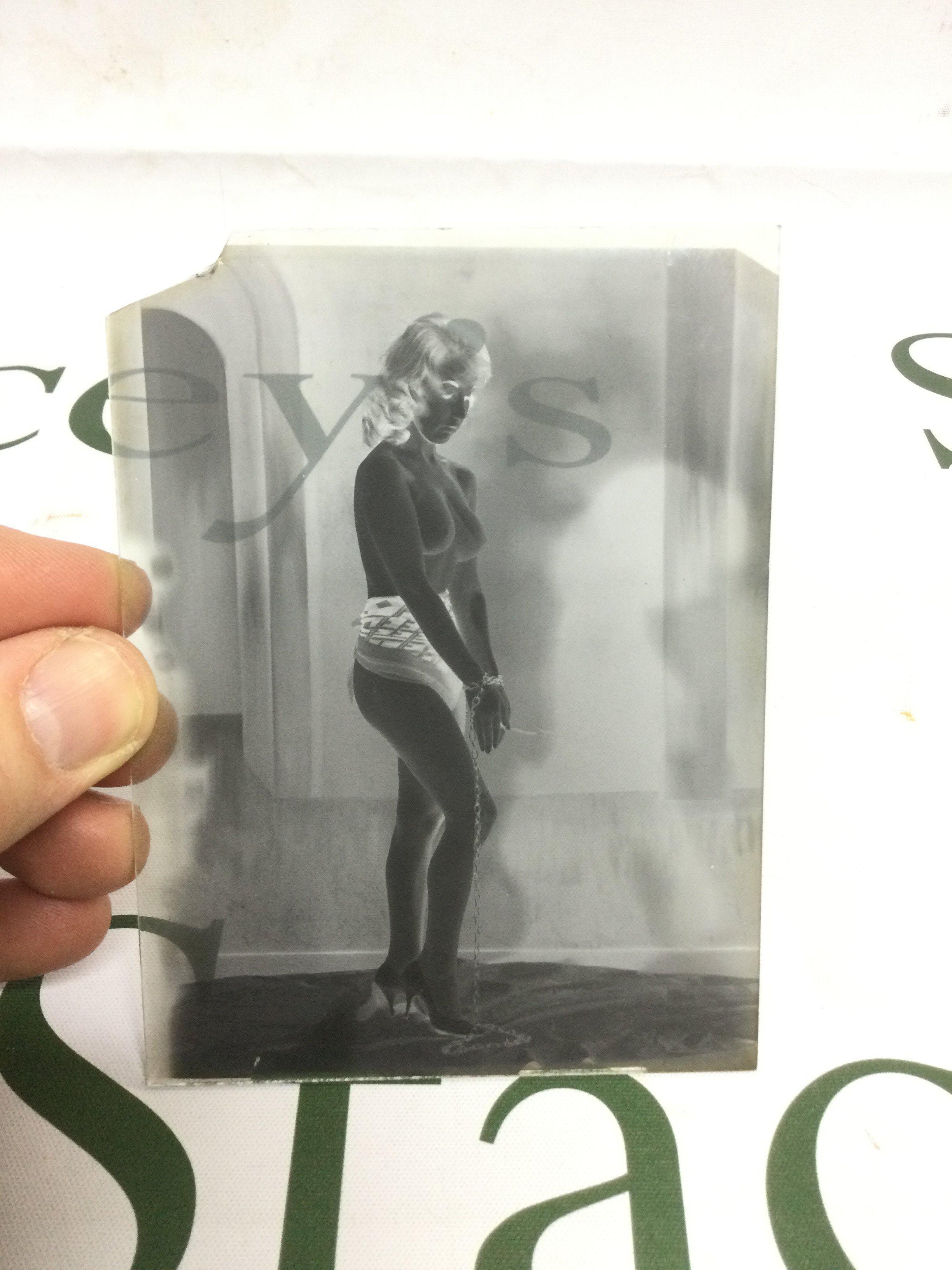Eight photographic glass plates of a female model, some nude images. Shipping category D. NO RESERVE