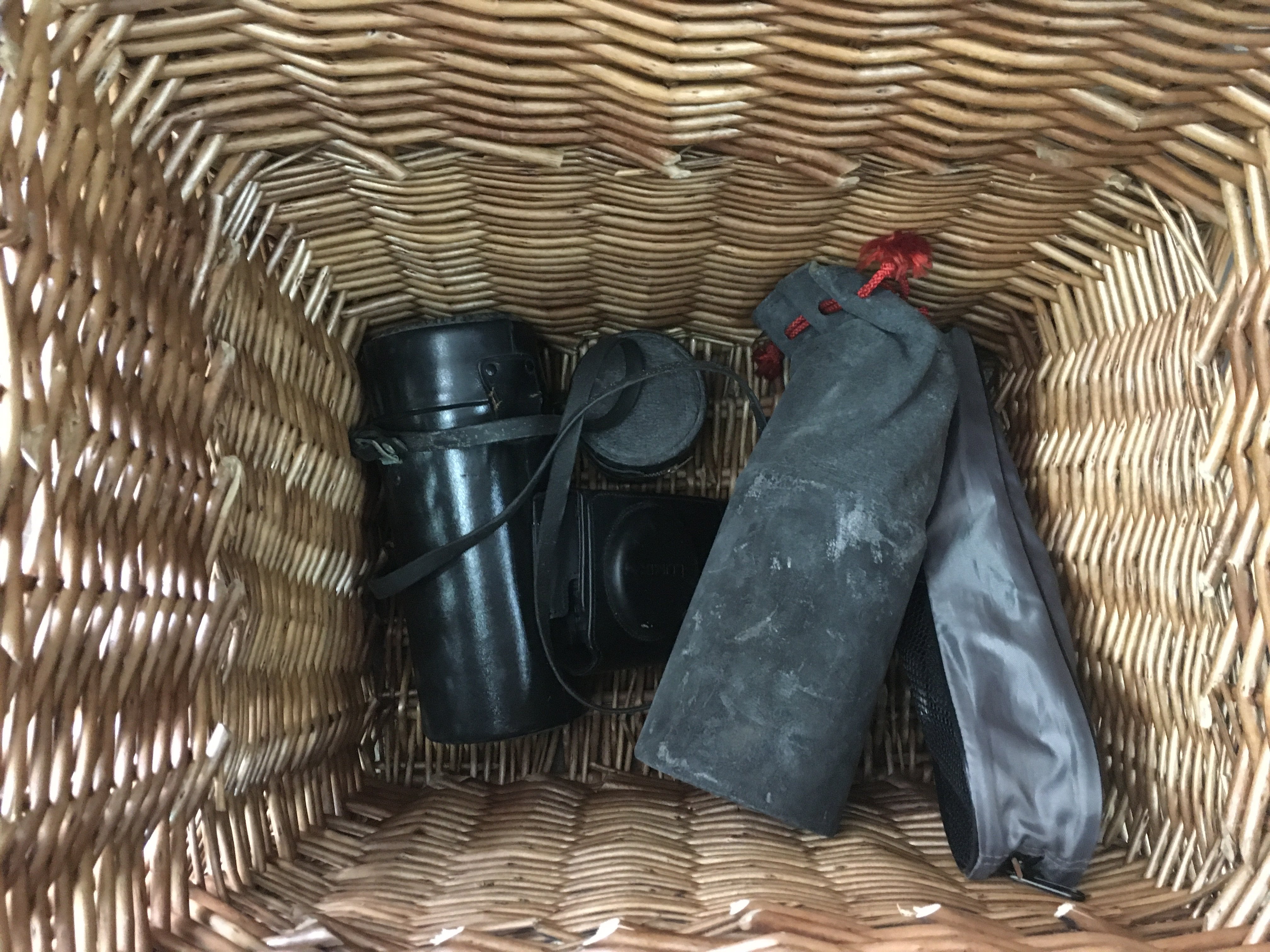 A small collection of cameras lenses and a Yashica camera. NO RESERVE