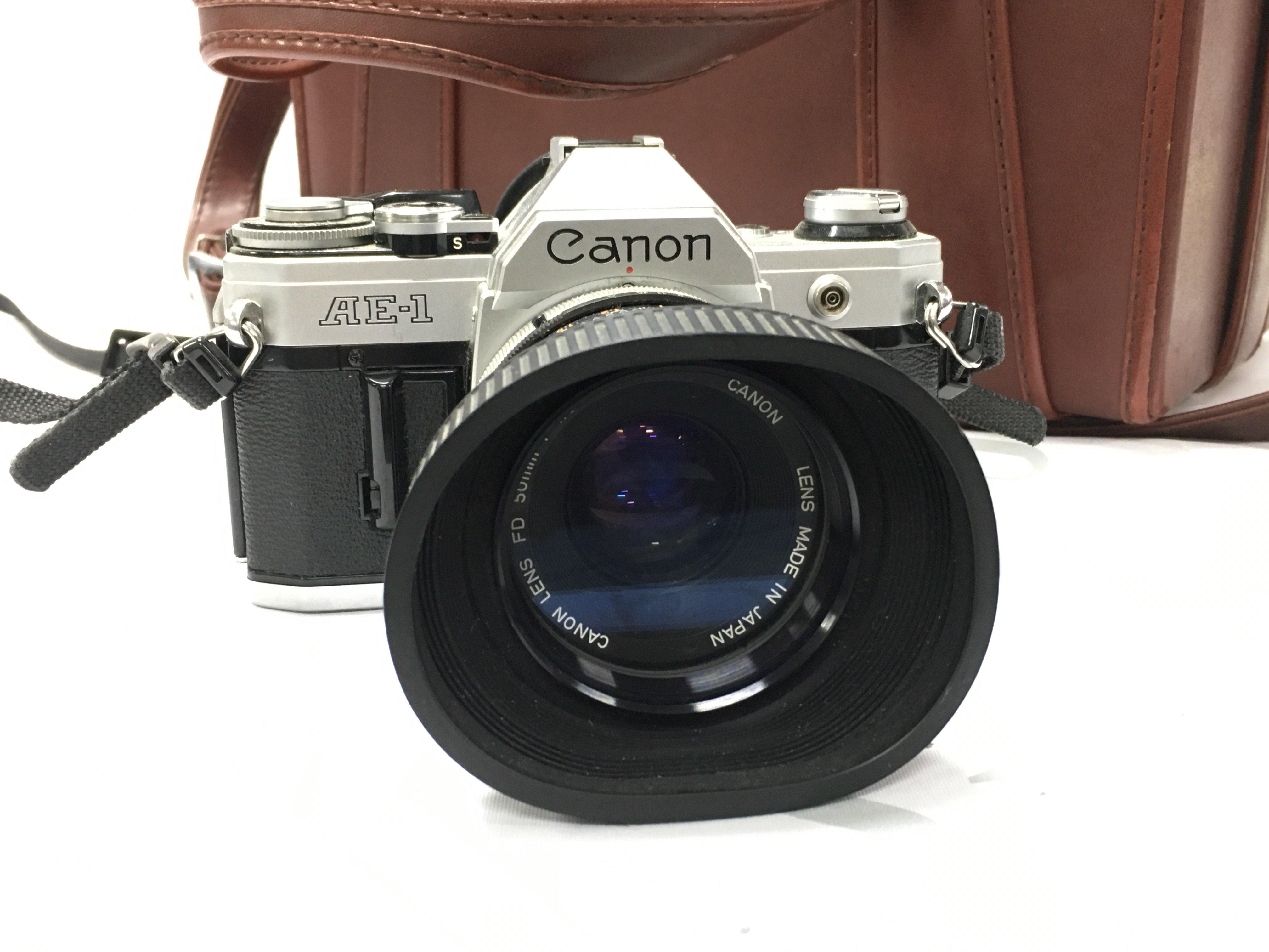 A canon AE-1 camera with extra Tamron 150mm lens , plus case . Postage category C. NO RESERVE