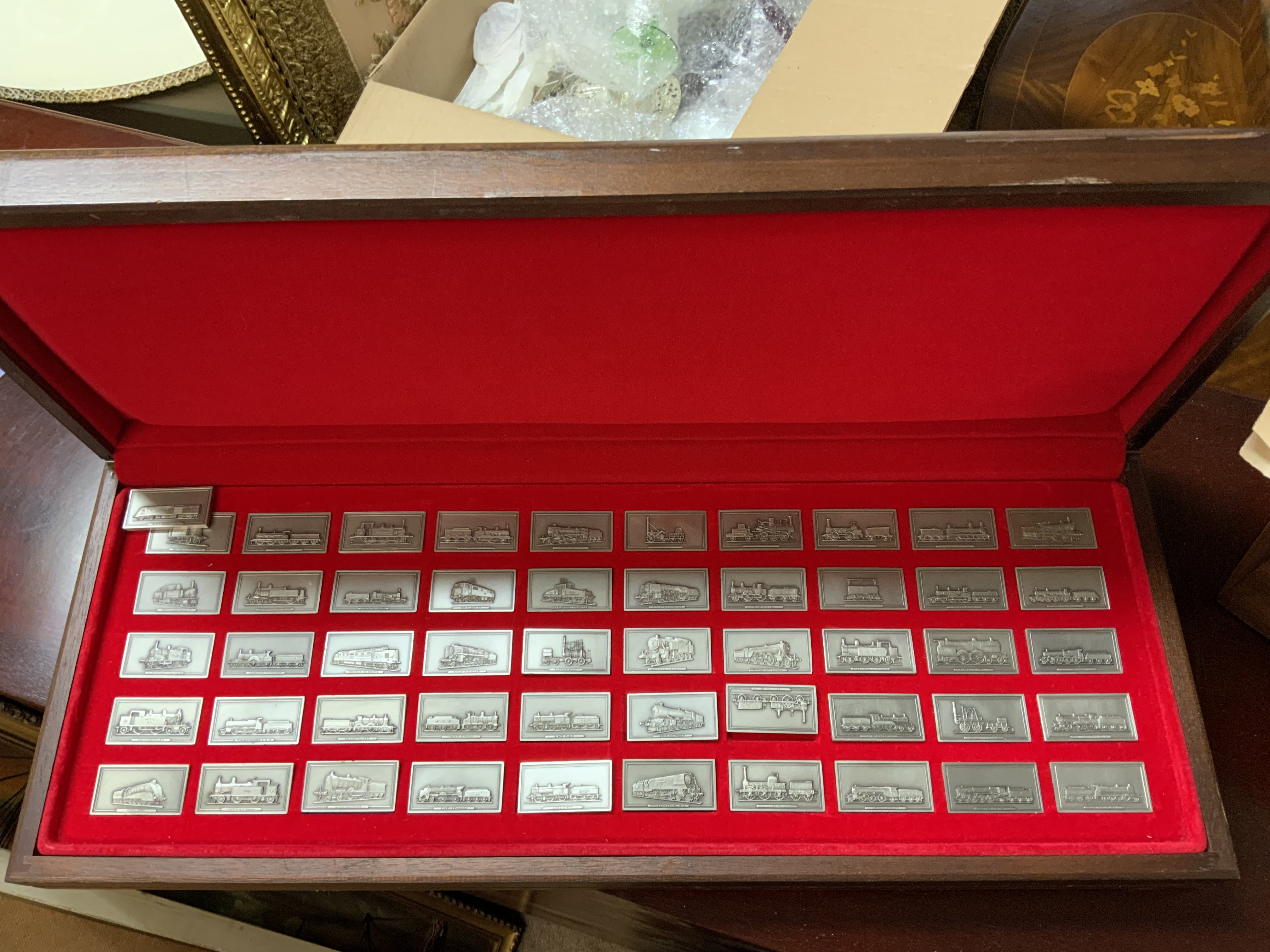 A cased collection of Pewter British Locomotives ingots. (D) NO RESERVE