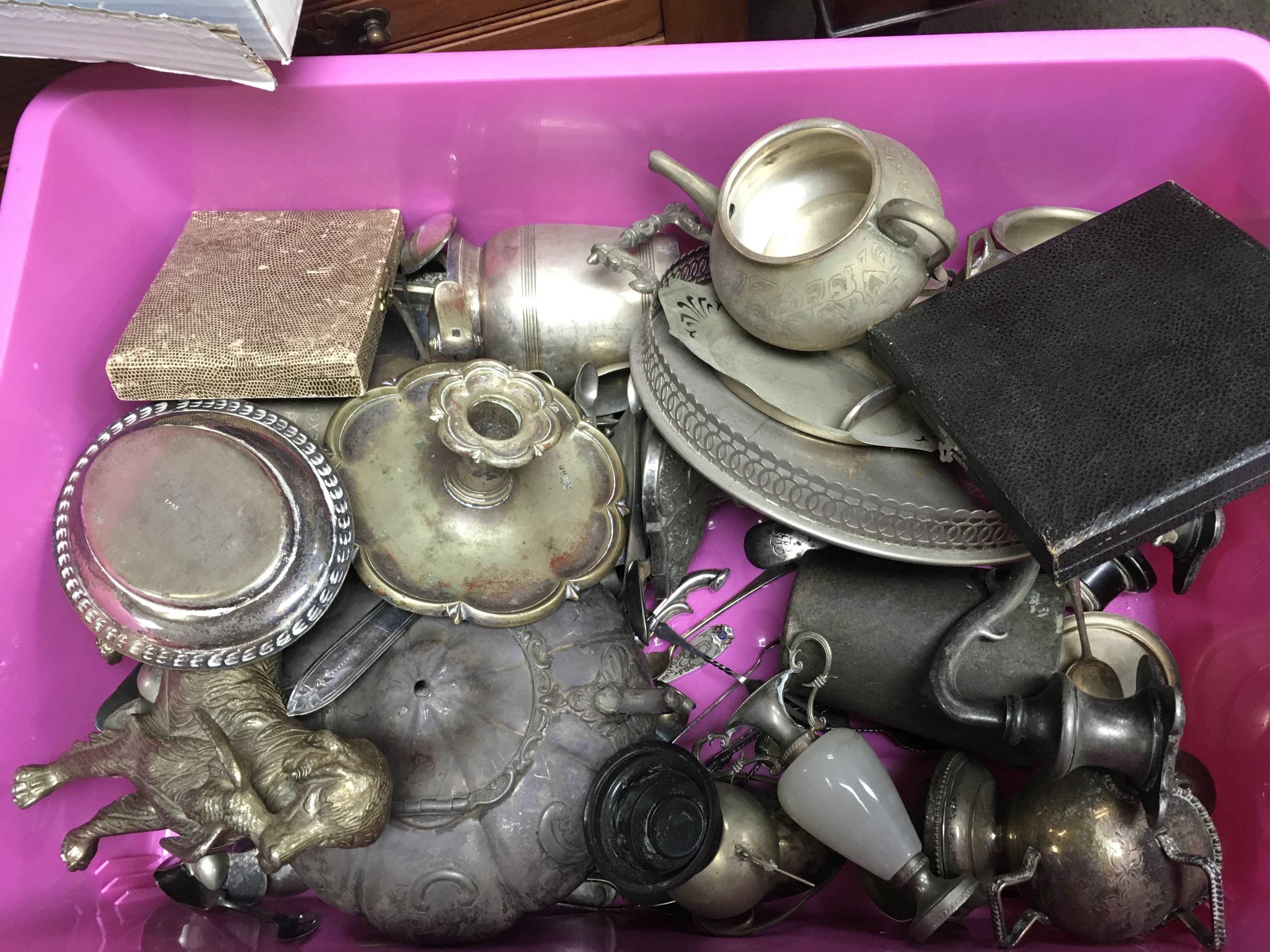 A collection of silver plated items including a hunting dog figure, candelabra, spoons, trophies etc. postage category c