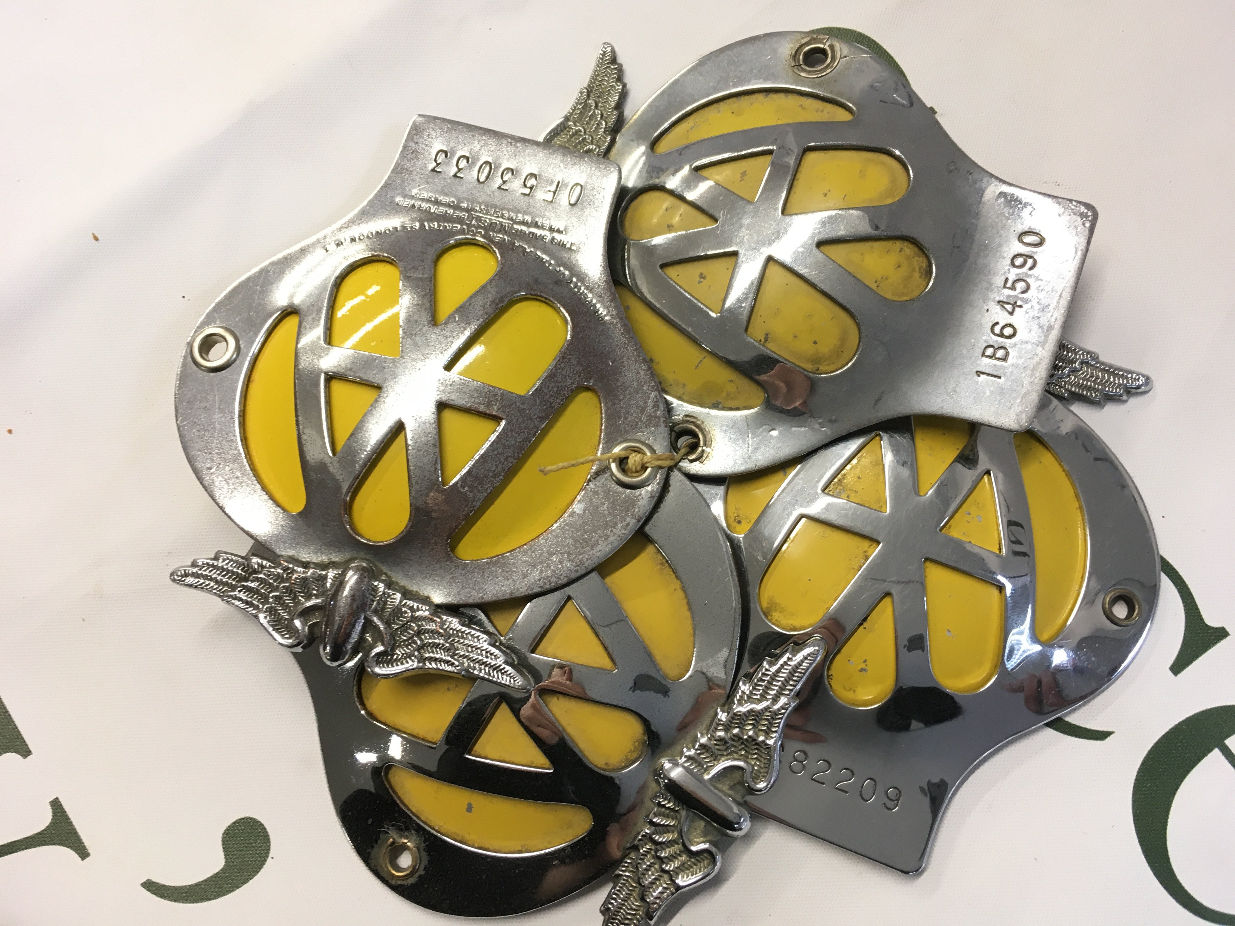 Four vintage AA badges . No reserve Postage cat A