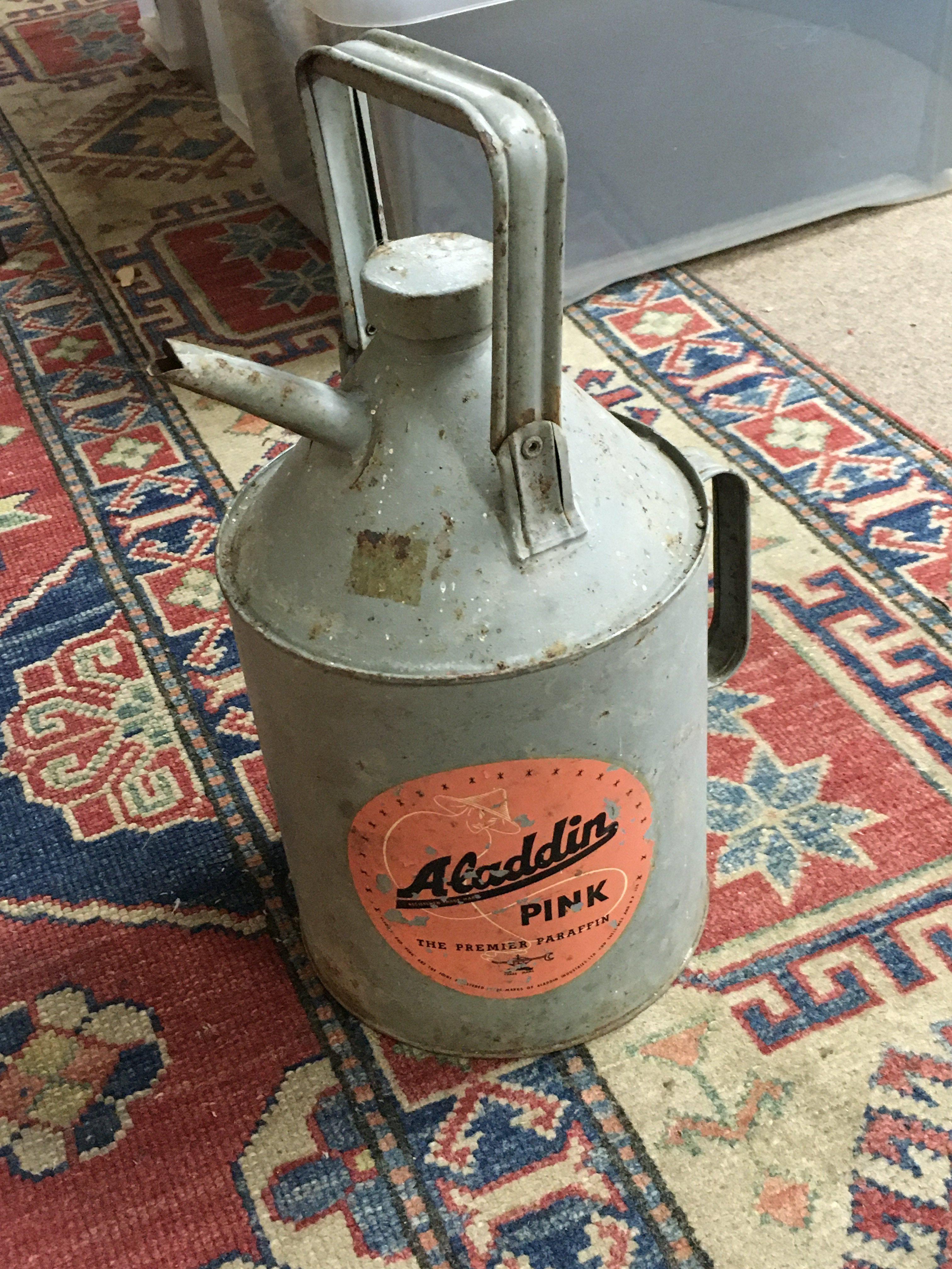 A Pink and Green Aladdin pink paraffin Can , no reserve postage category C