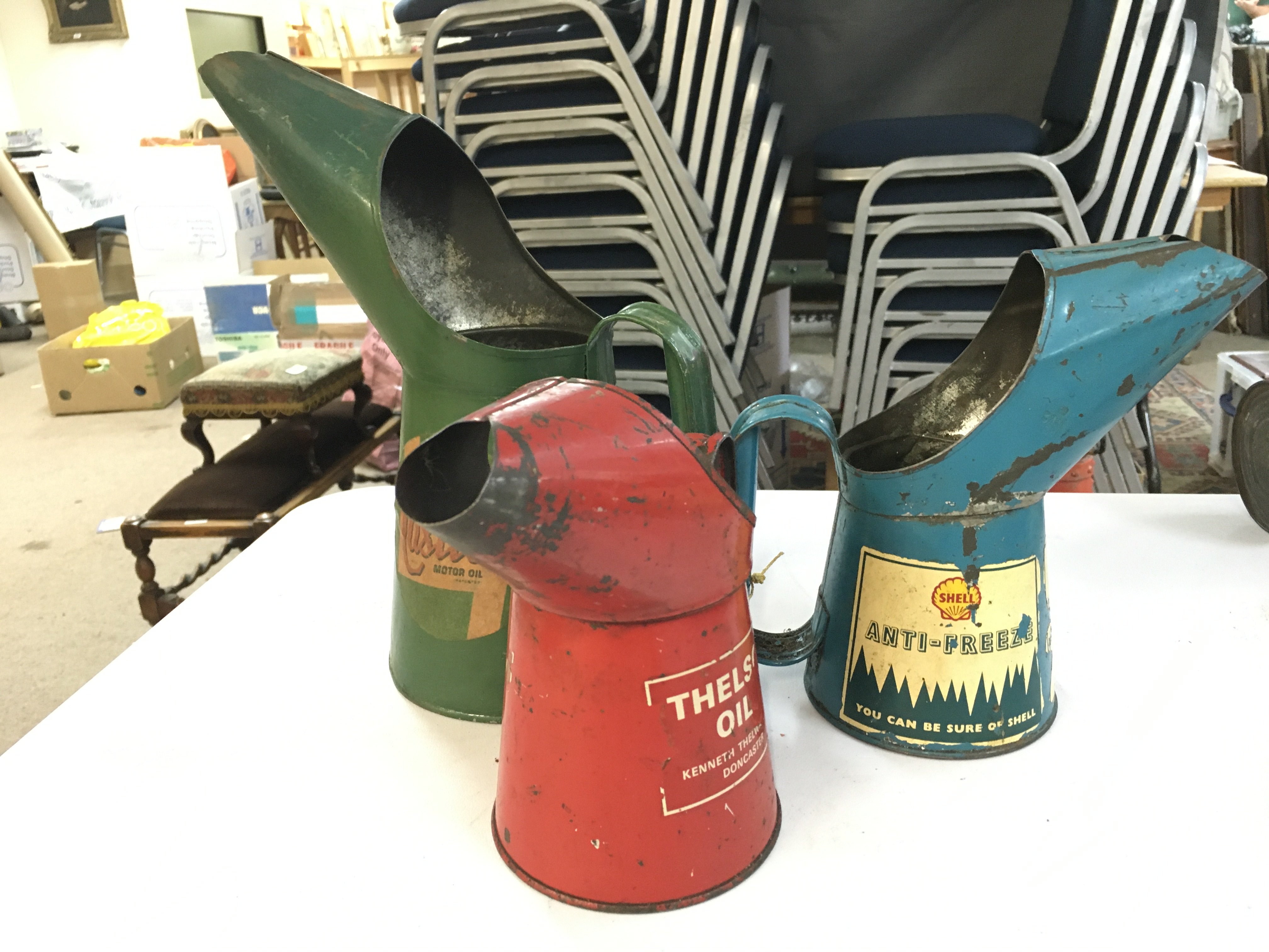 Three vintage oil jugs, castrol, shell, Thelson. No reserve
