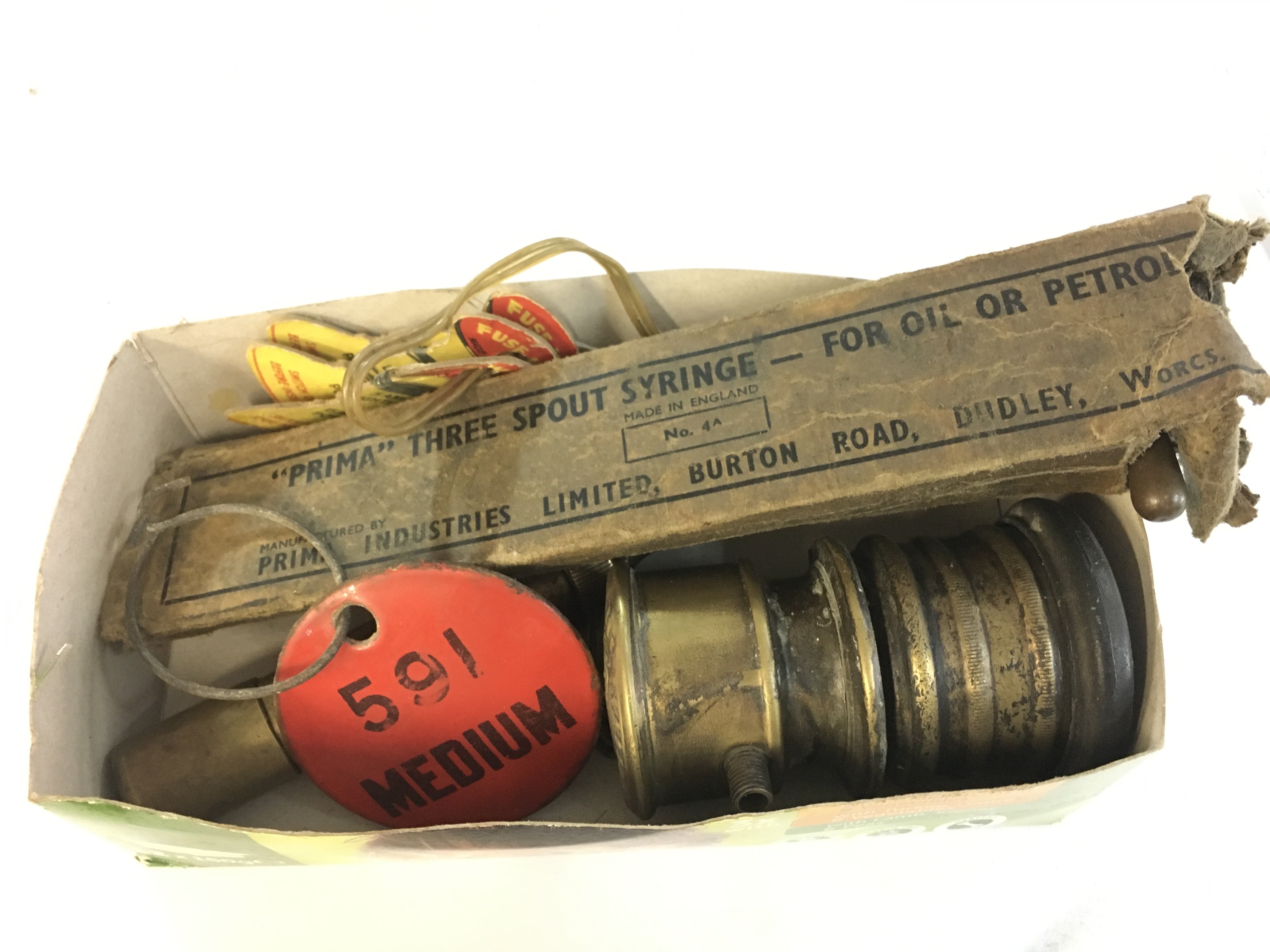 A vintage syringe and other motorist items, postage category B NO RESERVE
