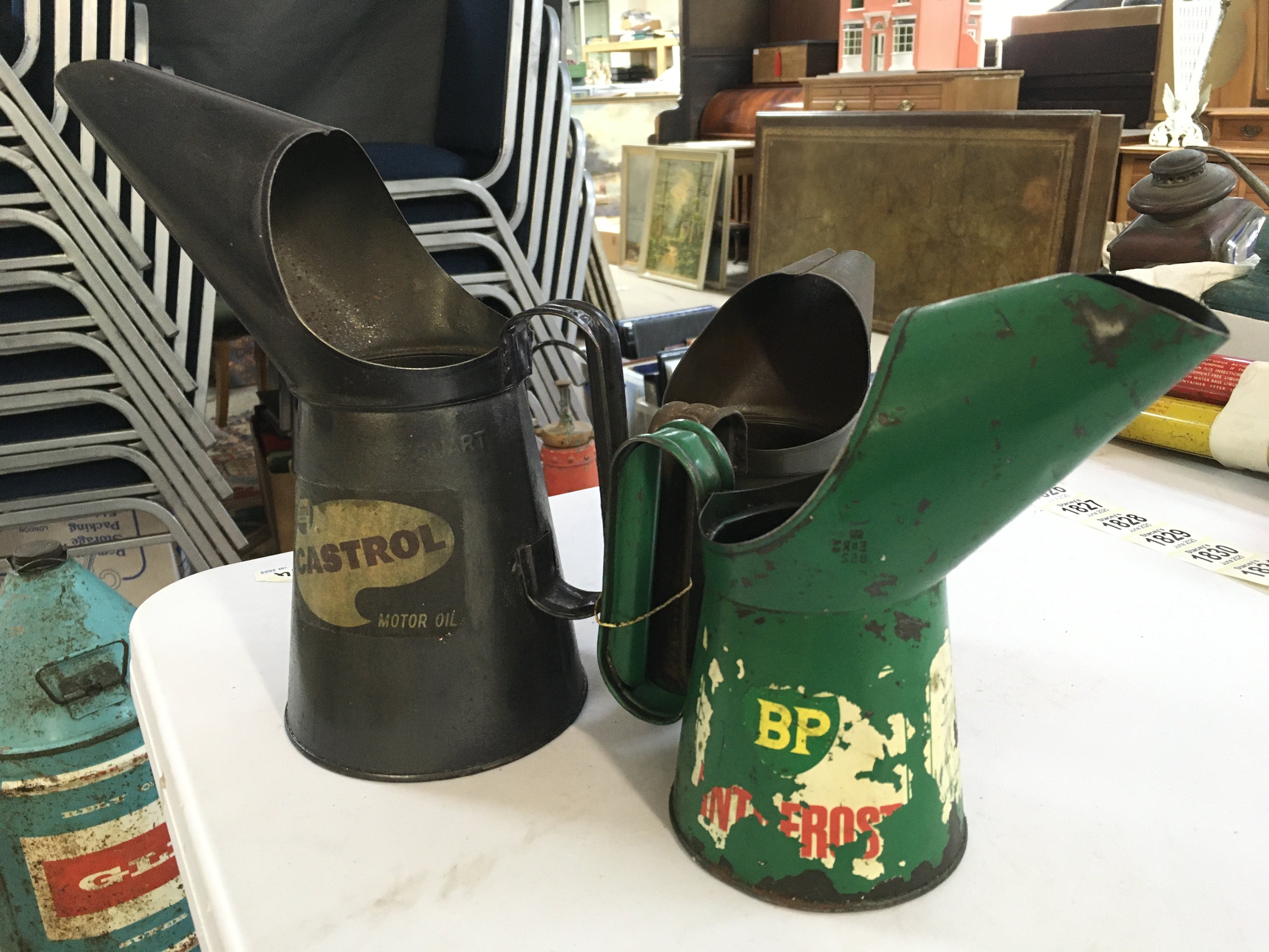 Oil jugs including Castrol GTX, BP ANTI FROST, CASTROL motor oil. No reserve Postage category B