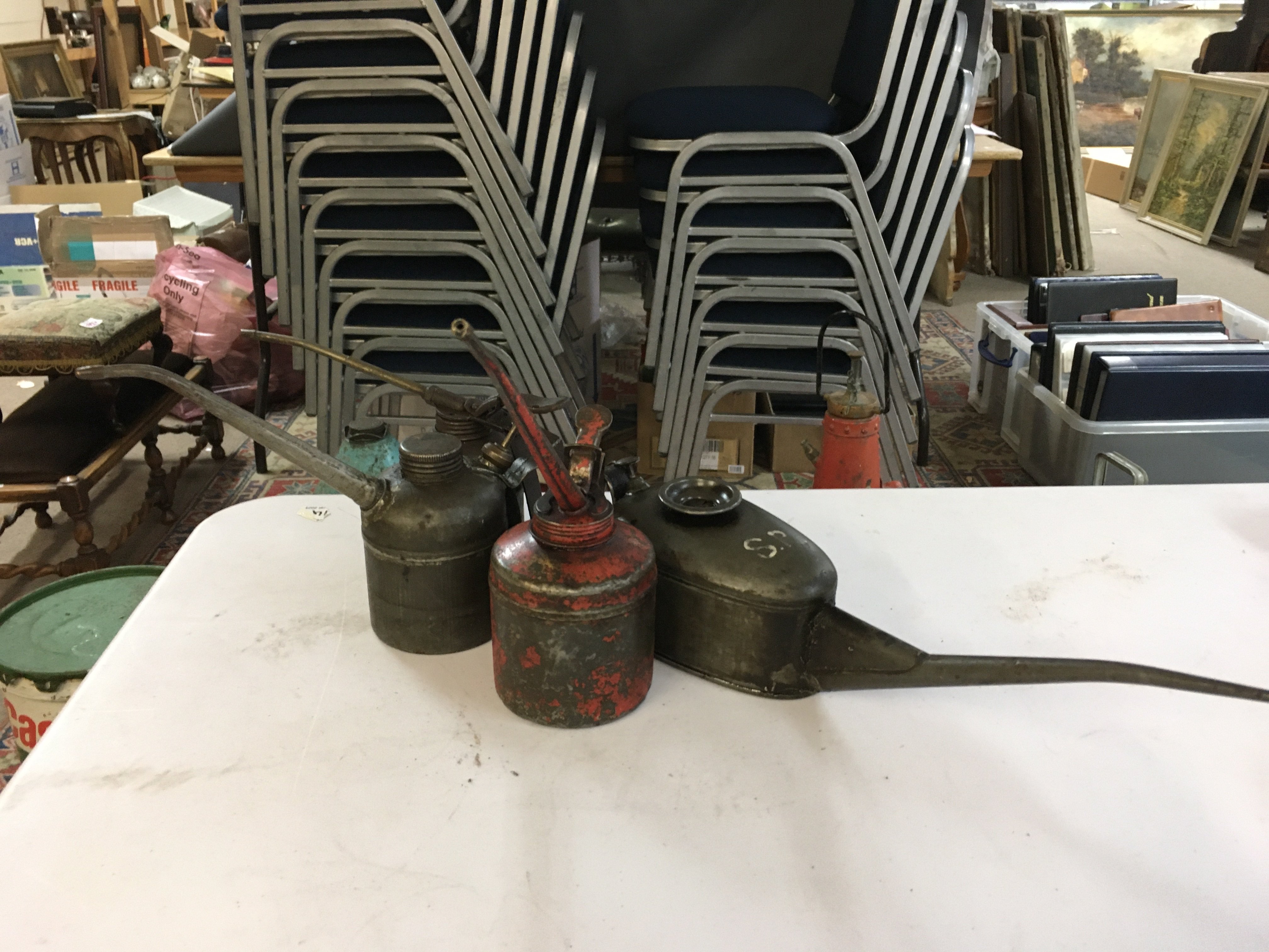 Four vintage Squirty Oil cans, postage category B