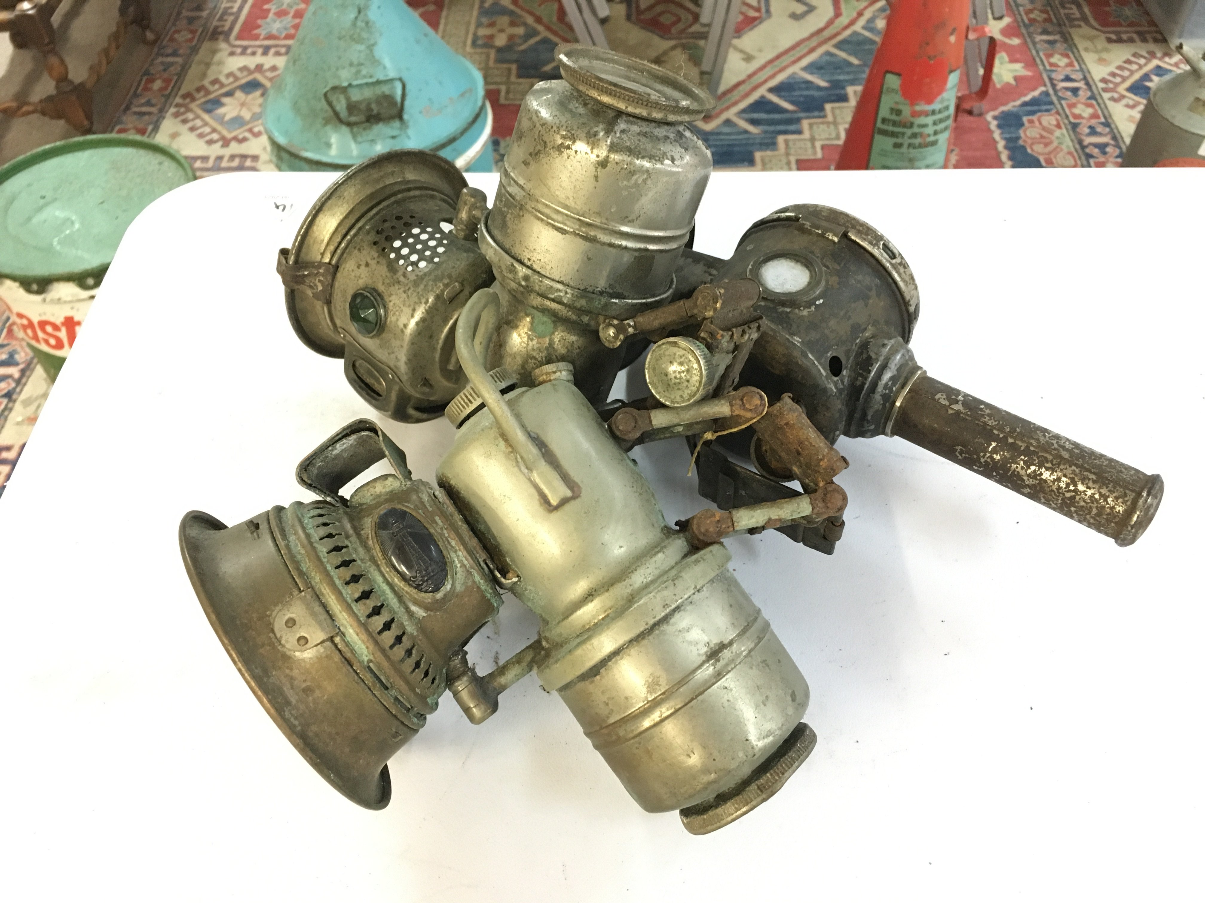 Three vintage bike lamps . This lot cannot be posted