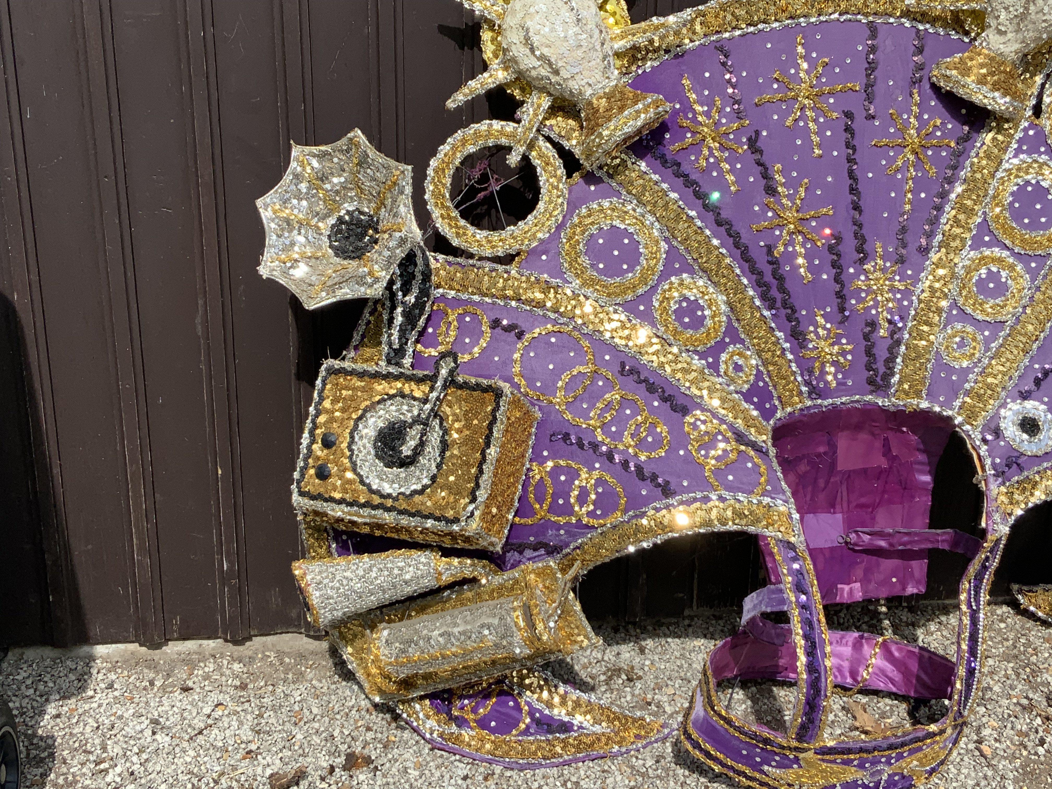 An elaborate Mardi Gras costume the theme of Film and Theatre, worn and made for the New Orleans Mardi Gras Circa 2010, Purchased at Vicky Vines Auction, Houston Texas. Wire framed and sequin covered. (A)