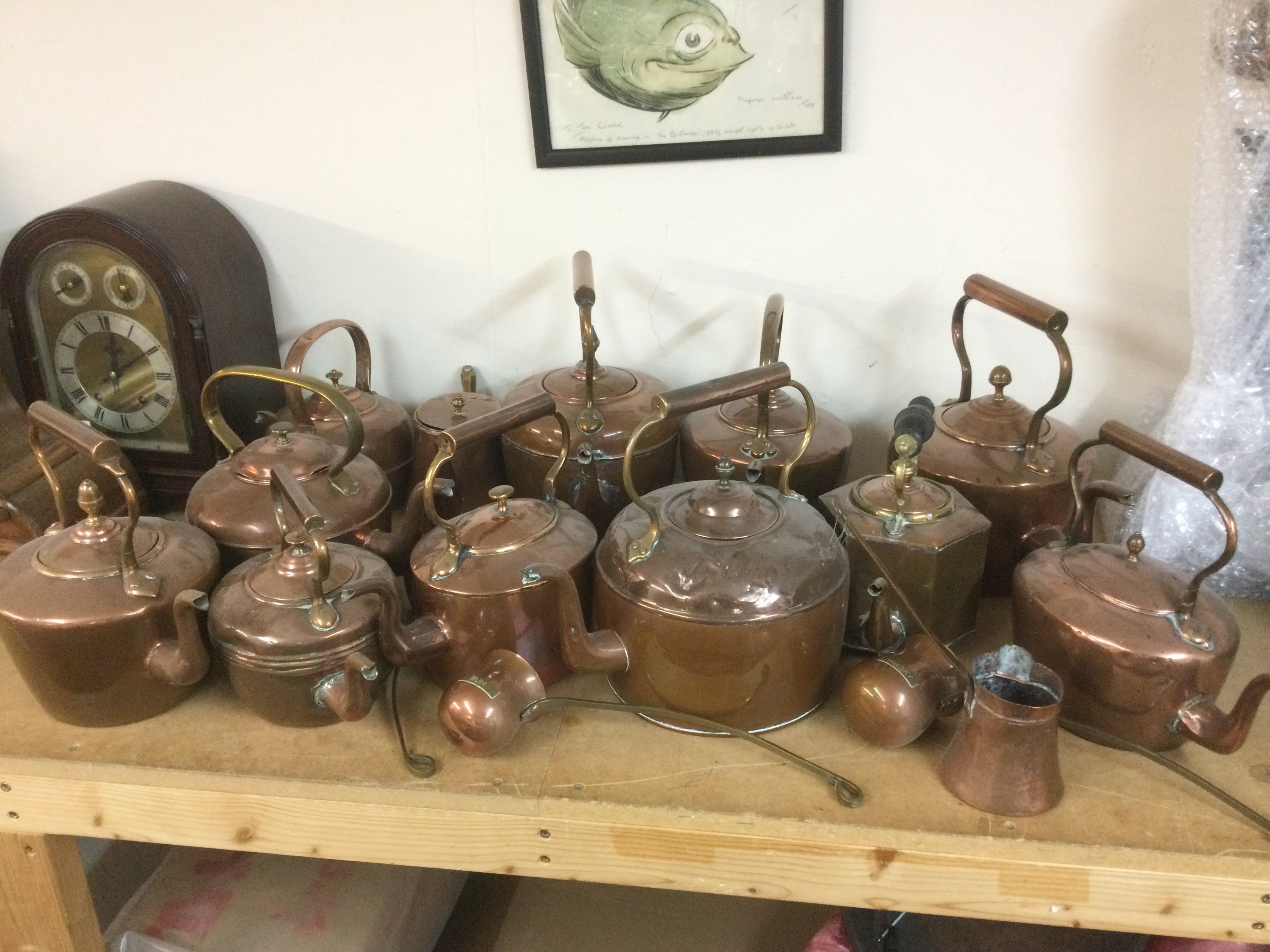 A collection of copper kettles, ladles and a large pan. Shipping category D.