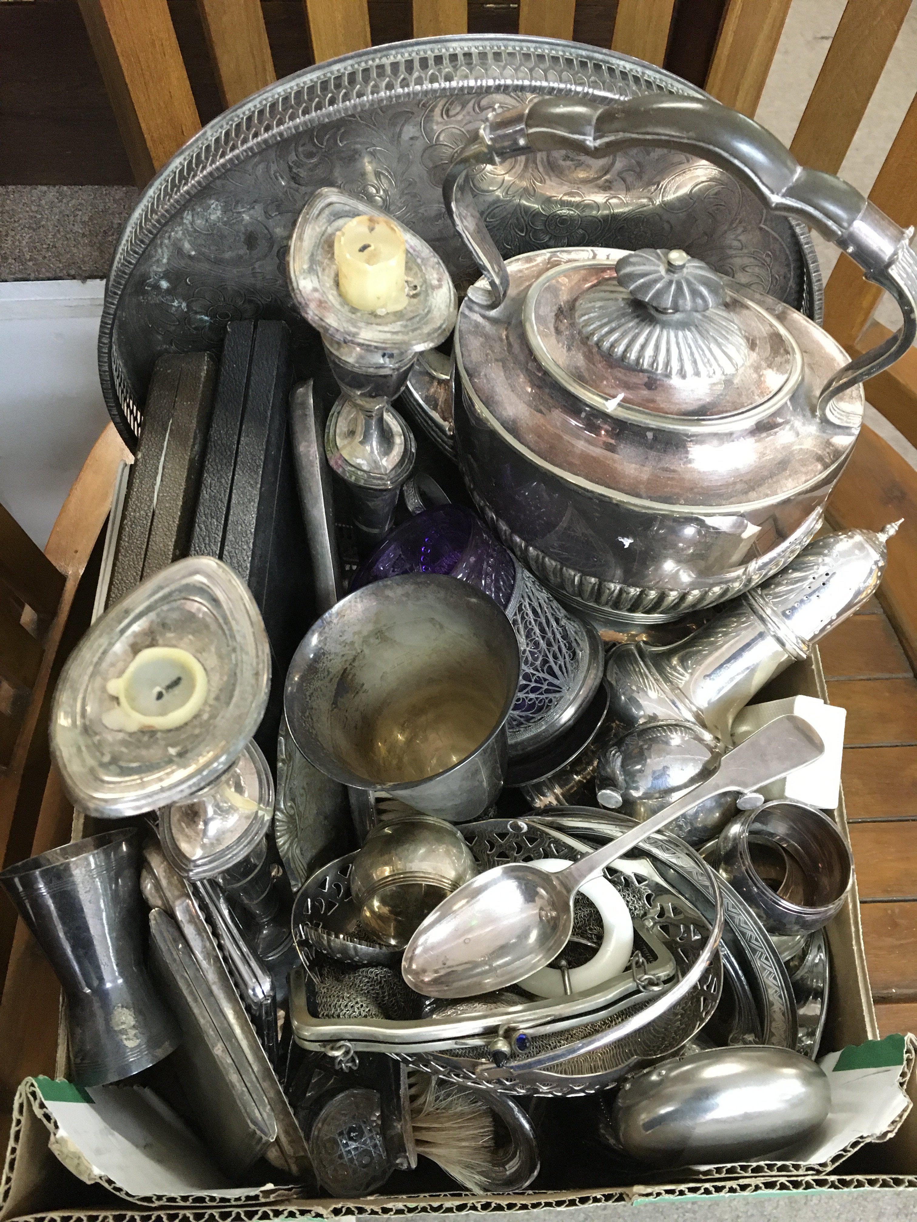A box of silver plate including candlesticks, dish, coin purse etc. postage category C