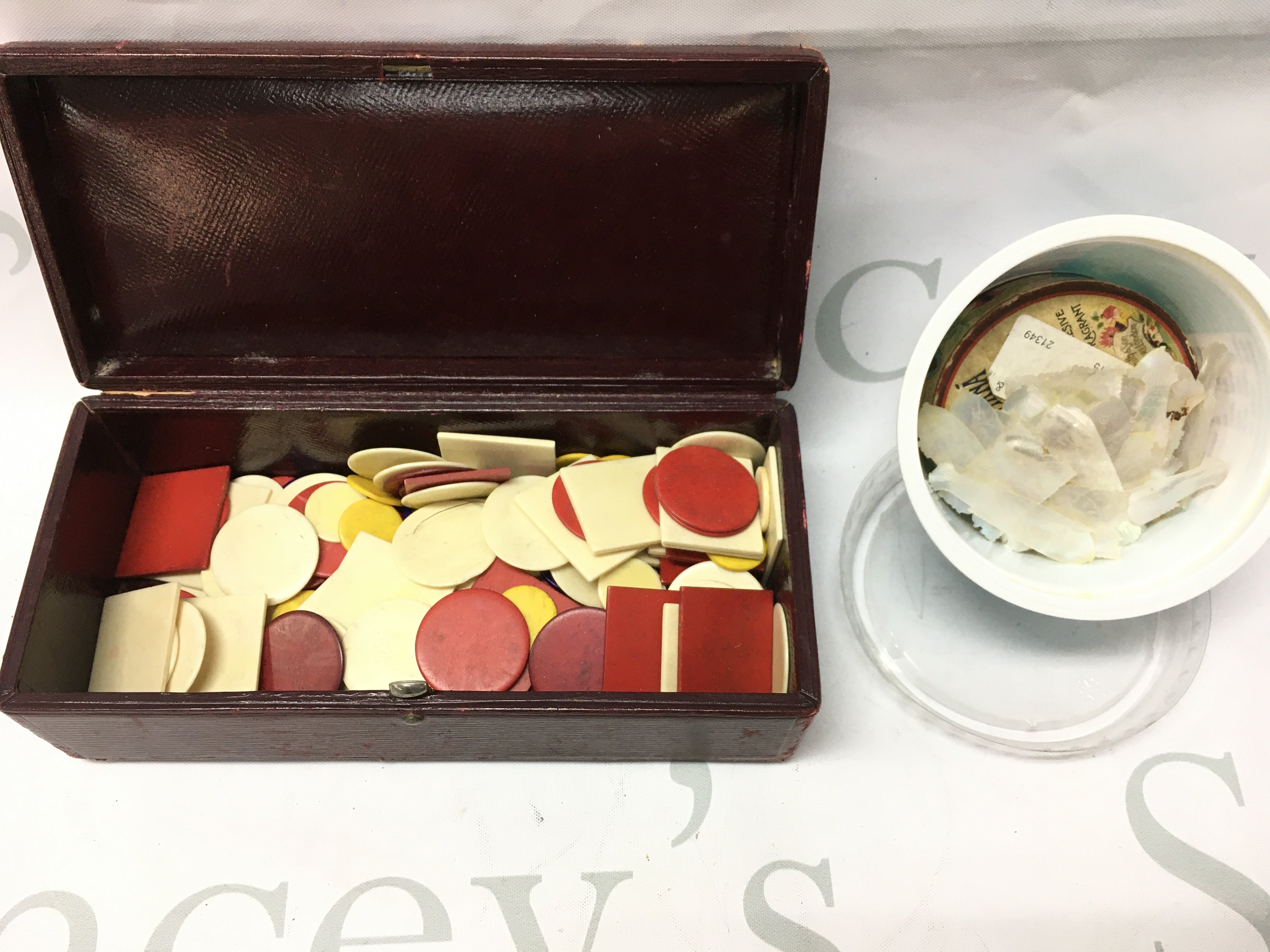 A collection of gaming counters including bone examples, Chinese mother of pearl counters etc. no reserve. Postage category B