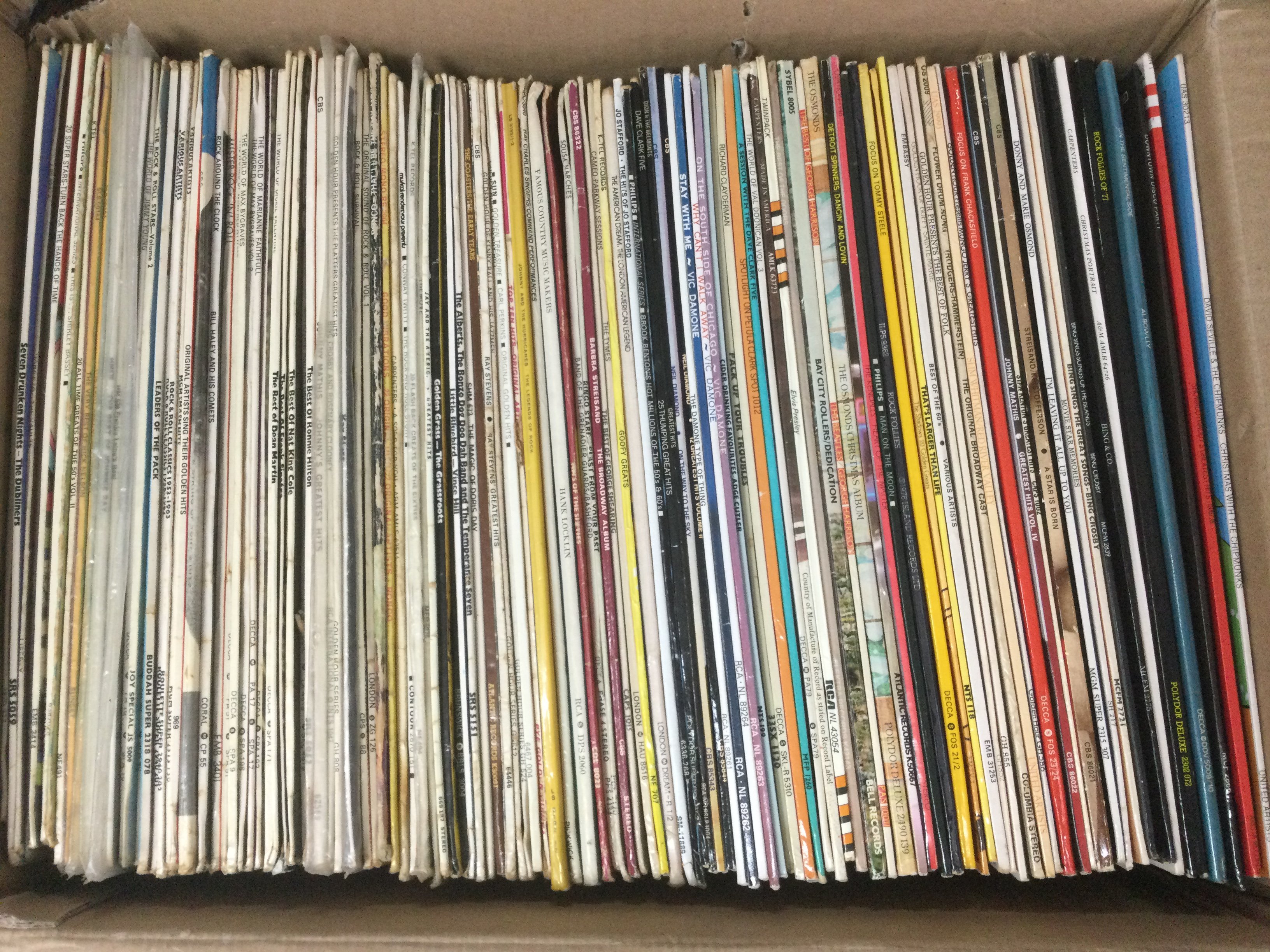 Five boxes of LPs by various artists including T Rex, Abba, The Monkees, Billy Fury and many more. Shipping category D.