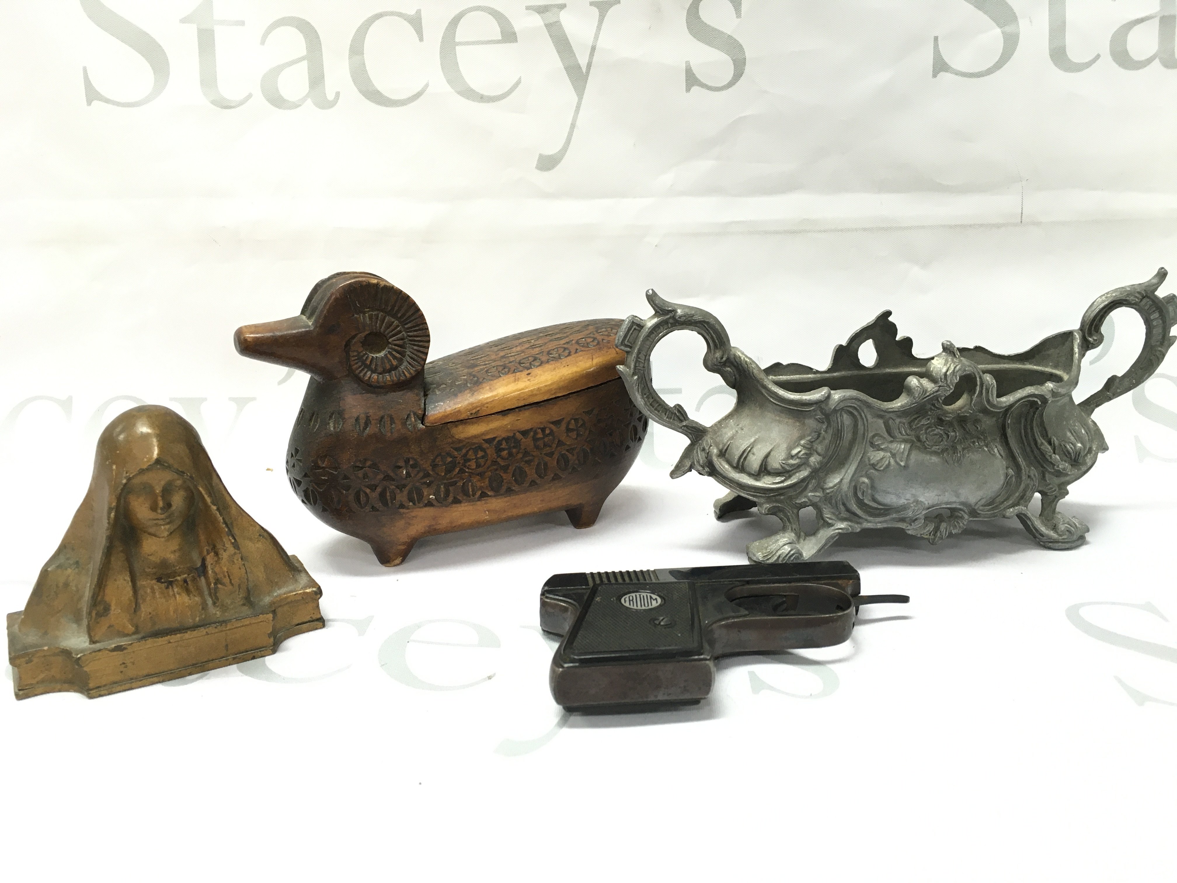 Vintage items including a German Fritum starting pistol, Art Nouveau pewter dish, wooden goat box, small Virgin Mary bust, dog nutcracker . Postage category B