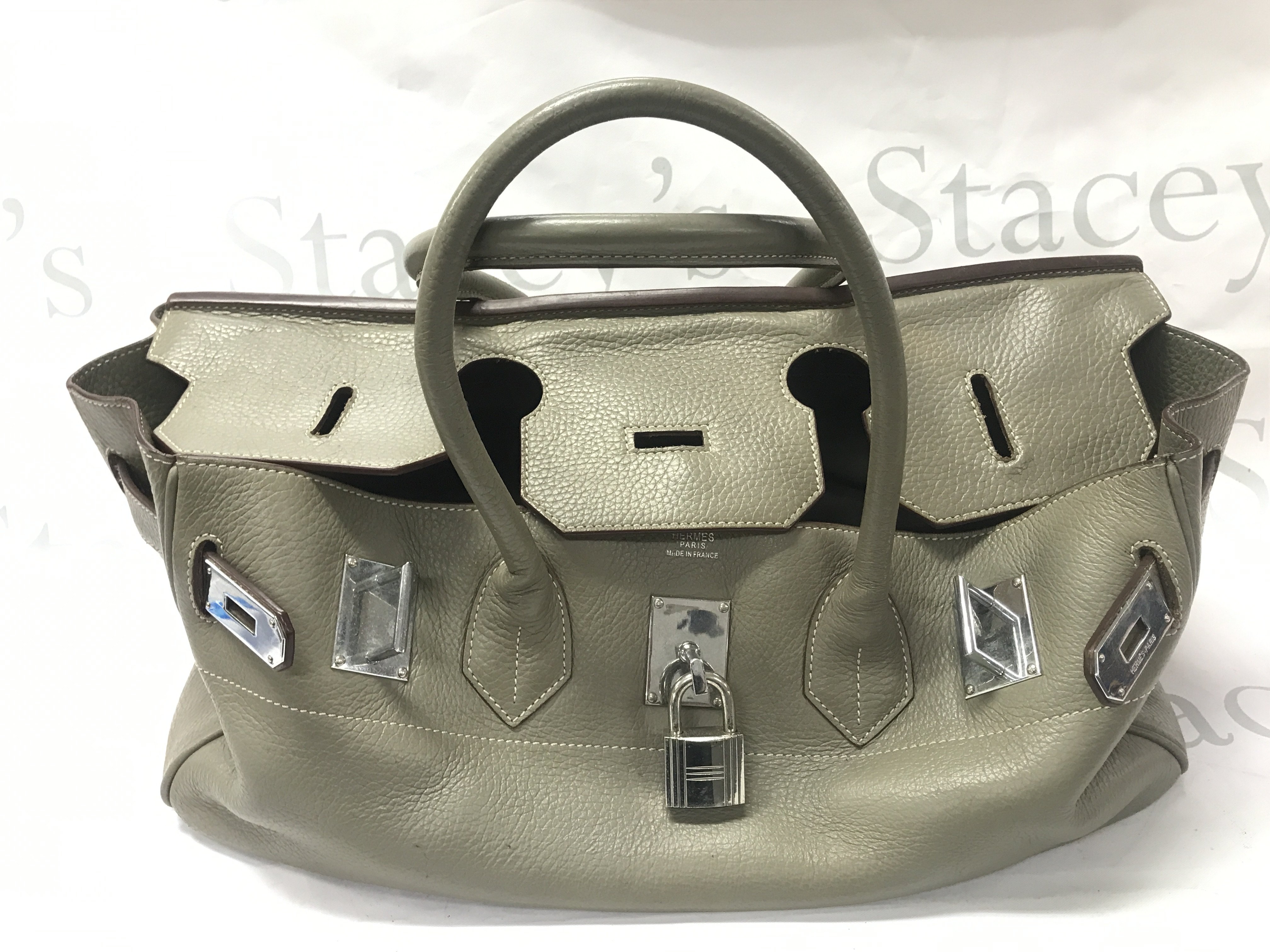 A leather Hermes bag. Postage category C