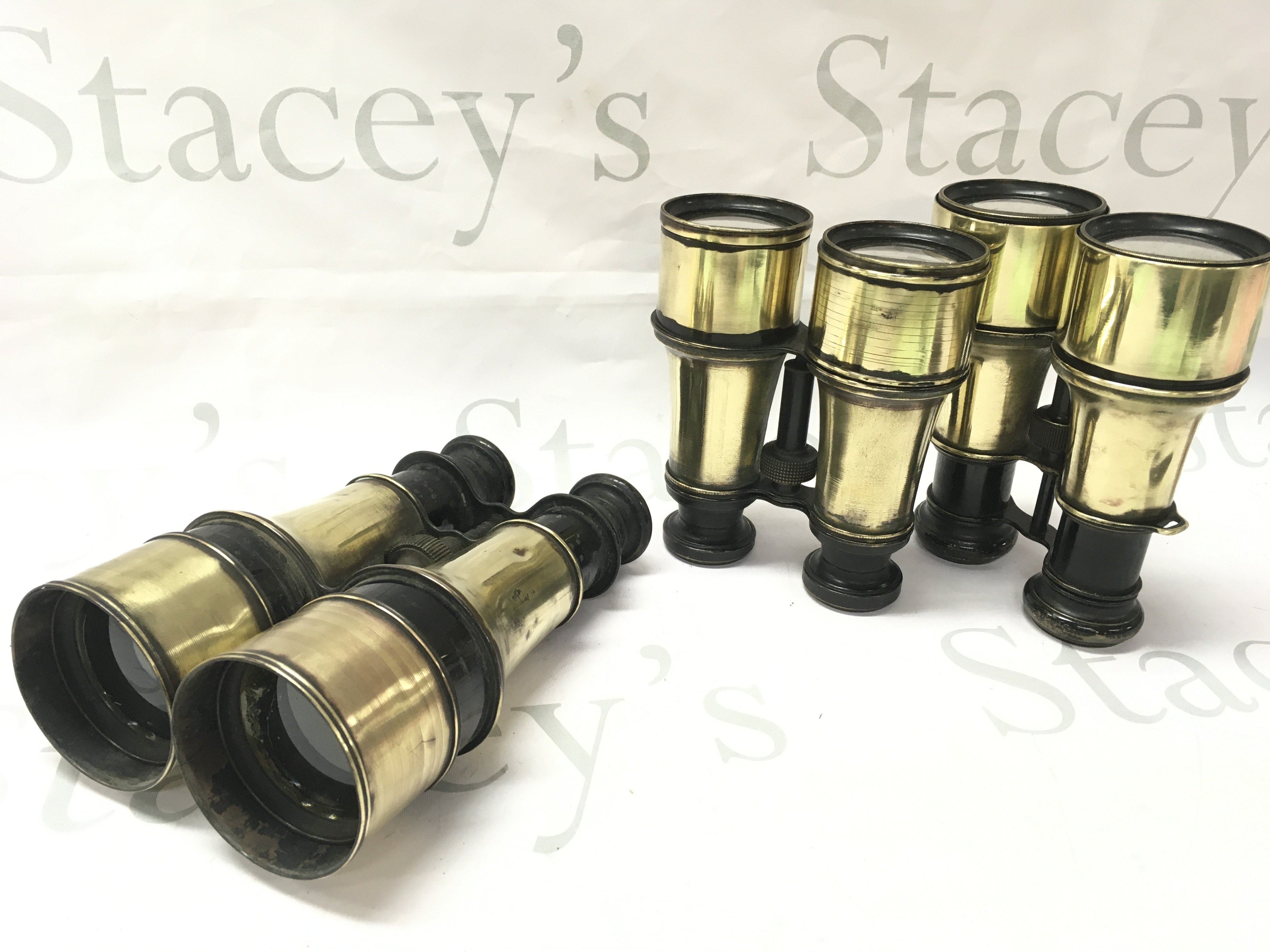 Three pairs of vintage brass binoculars , postage category C