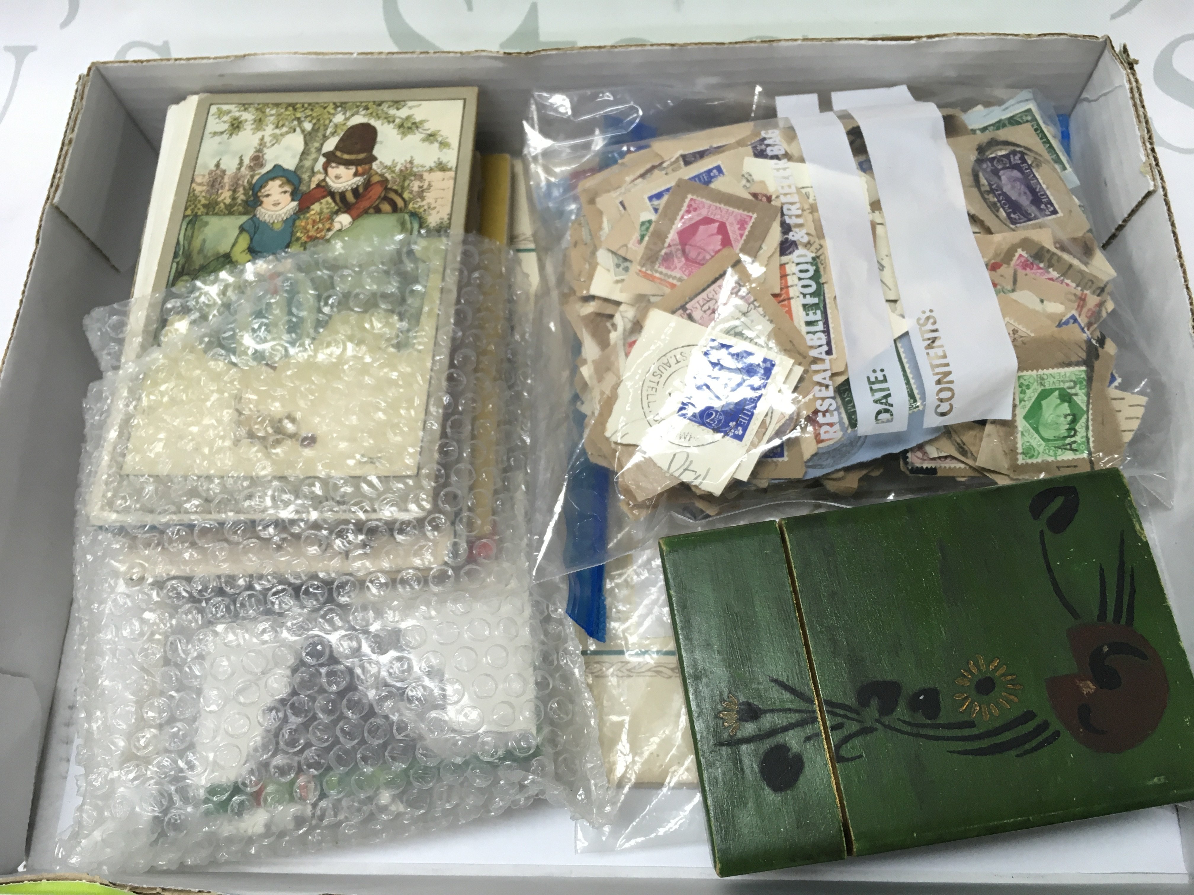 Collection of wartime postcards , stamps, playing cards etc. postage category B