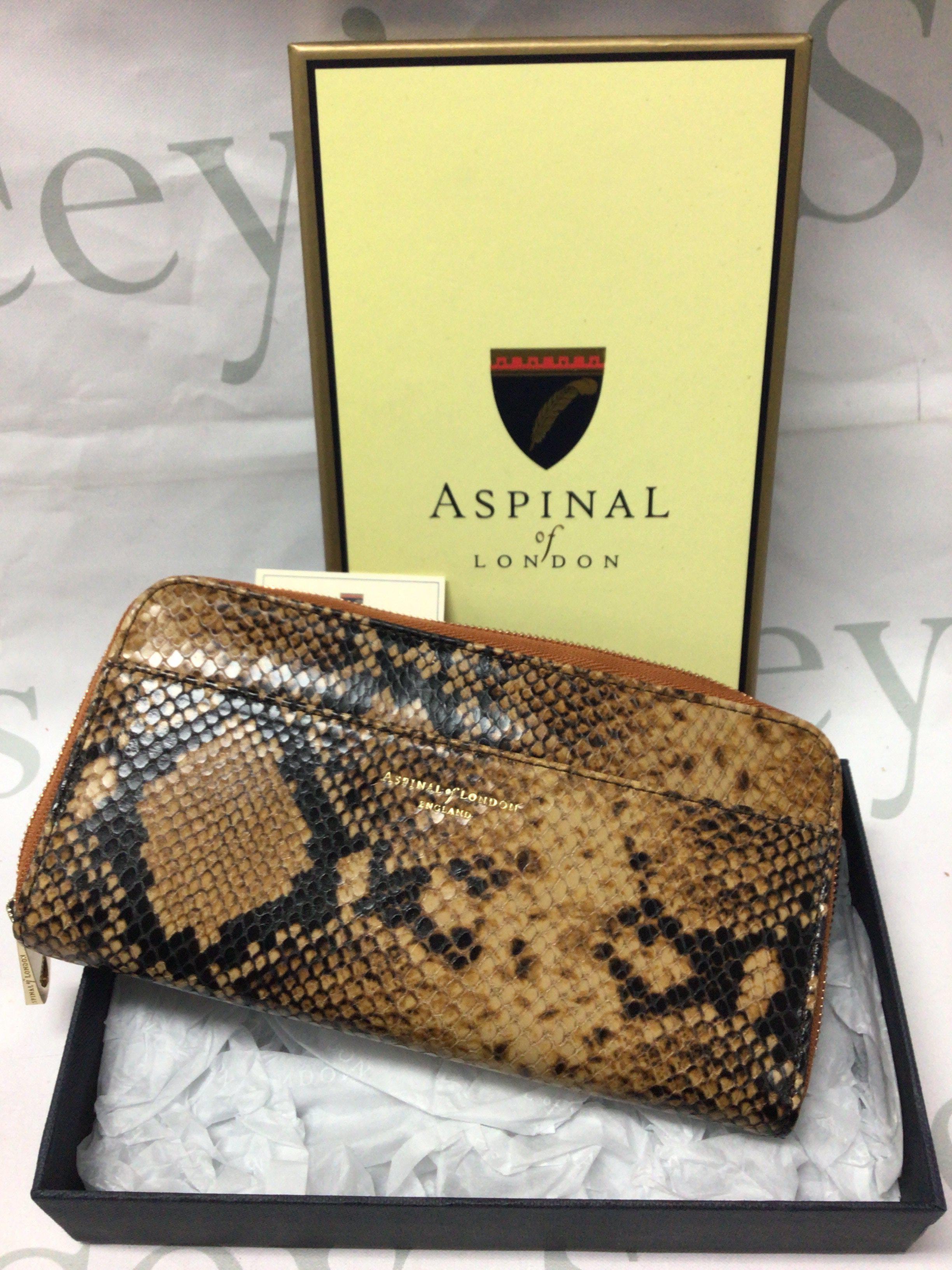 A boxed Aspinal of London leather purse