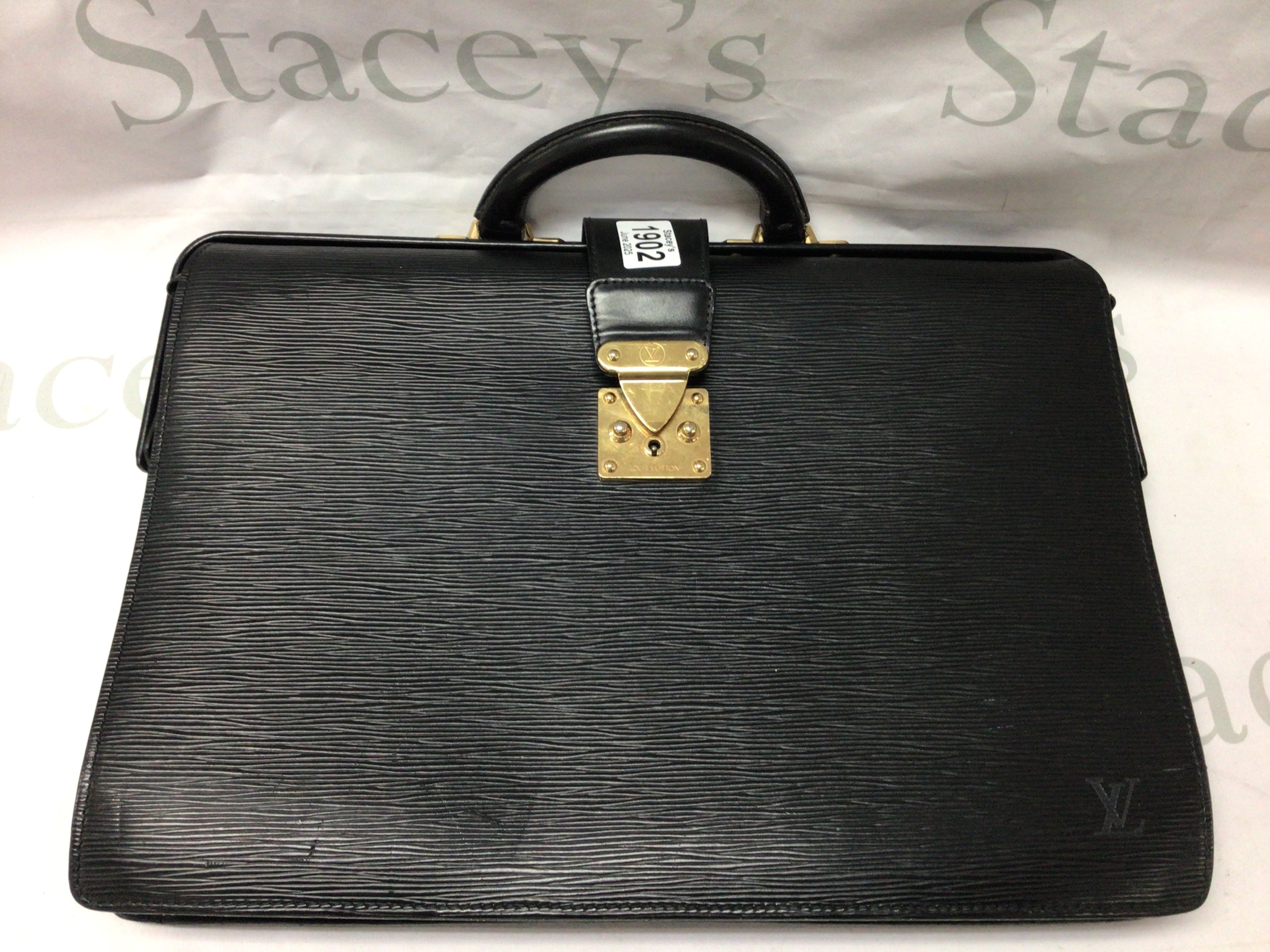 A Louis Vuitton brief case