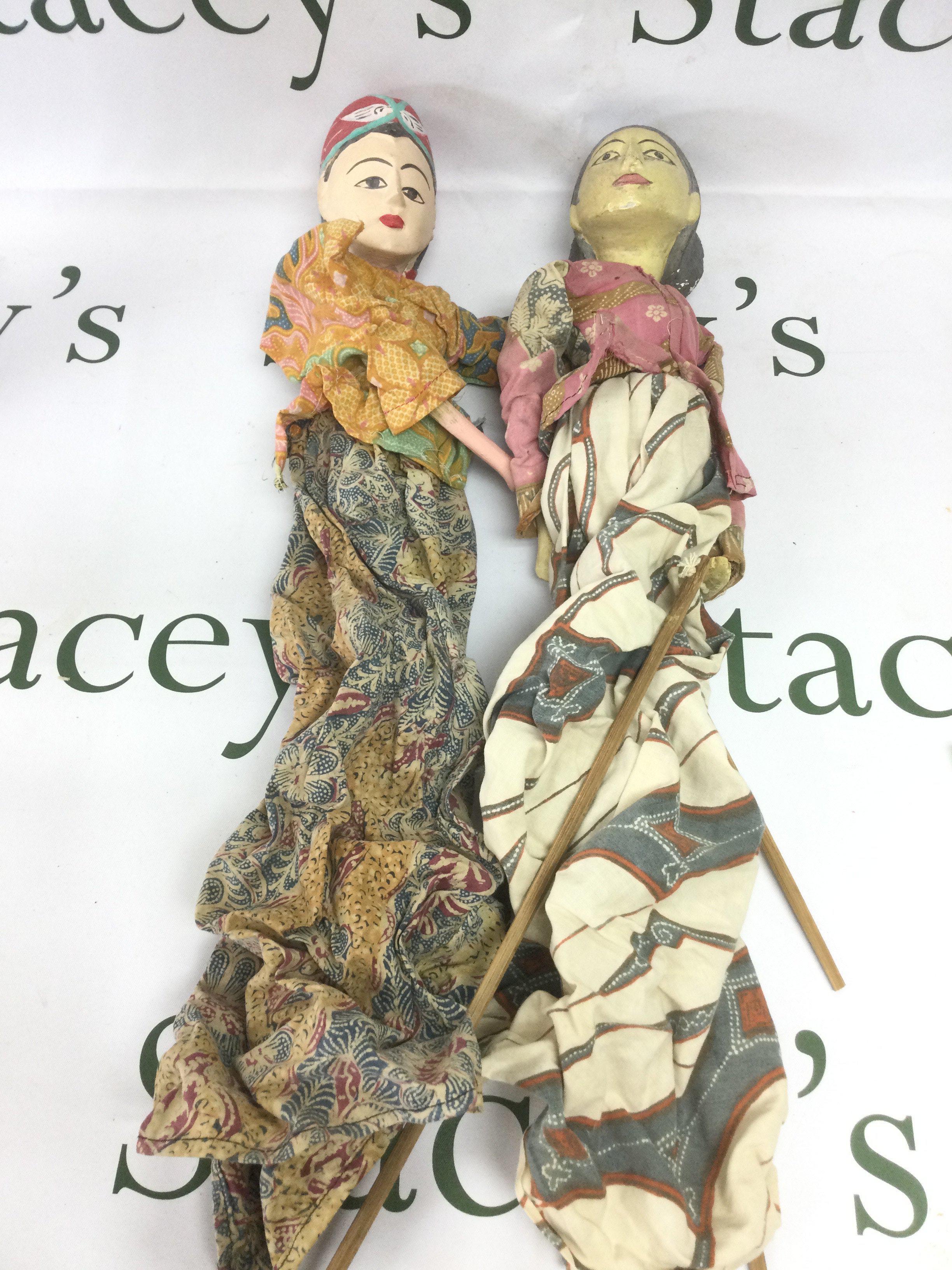 Two Eastern puppets. Shipping category B.