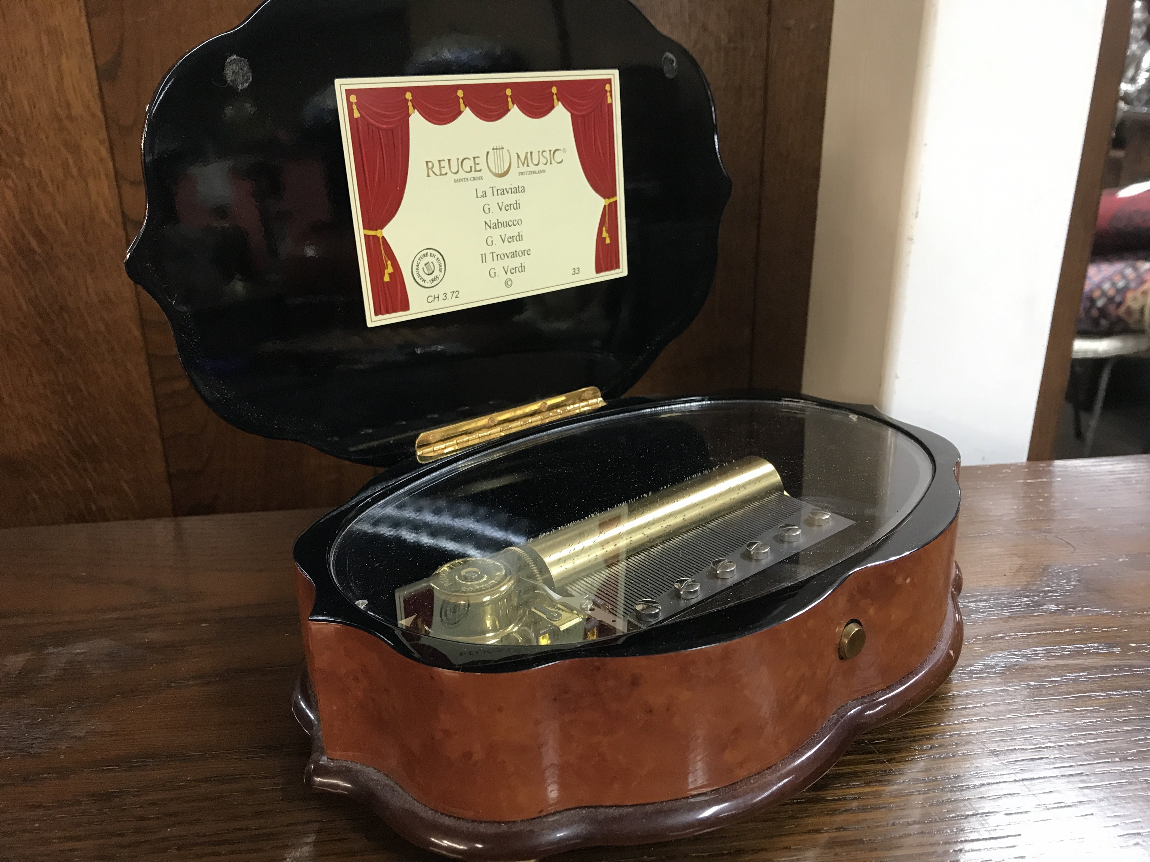 A Swiss Reuge Music box , seen working . 26cm wide, postage category B