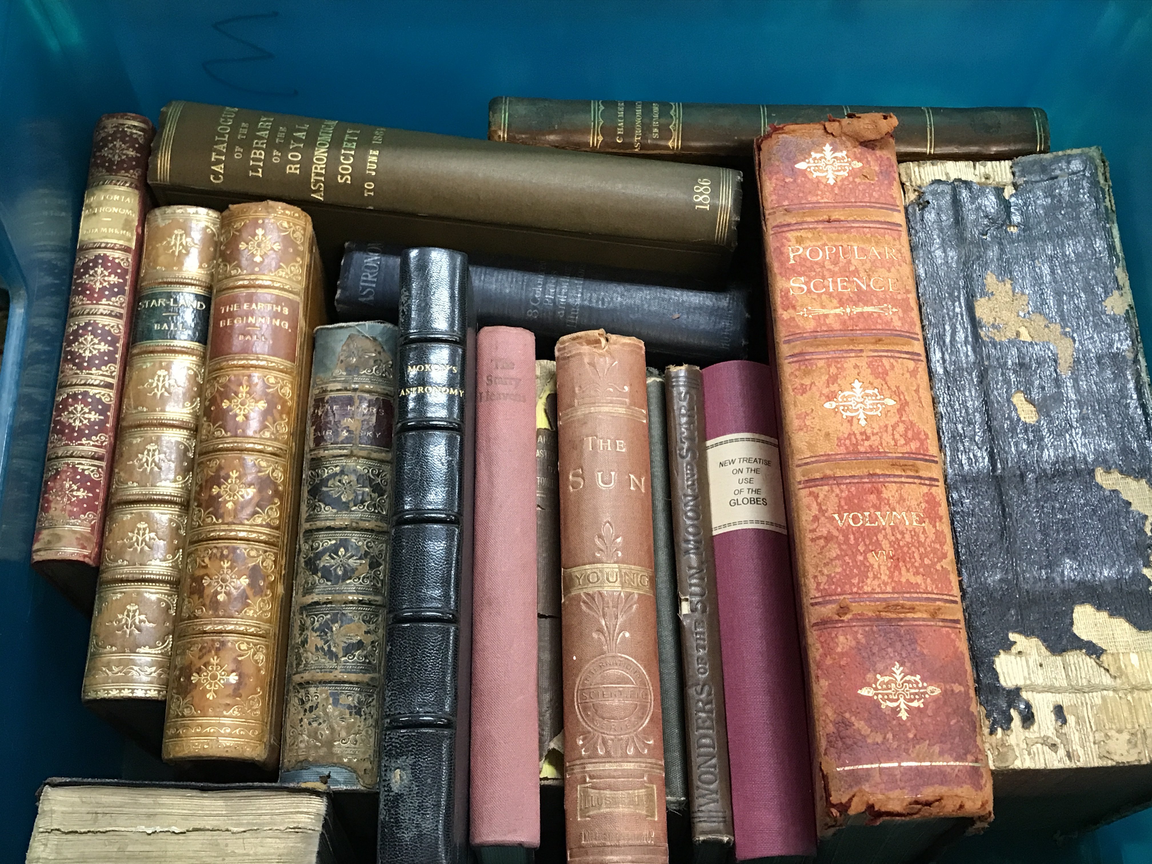 A Collection of vintage leather bound astronomy books including Pictorial Astronomy by George F. Chambers 1893, Star Land by Robert Stawell Ball, The Earths Beginning by Robert S. Ball, Tutor to Astronomy & Geography by Joseph Moxon circa 1671, Popular lectures on Astronomy by Rev L Tomlinson, New treatise of the se of the globes by Thomas Keith, Wonders of the sun moon and stars by Richard Russell, Popular Science volume seven and other books. Postage category C